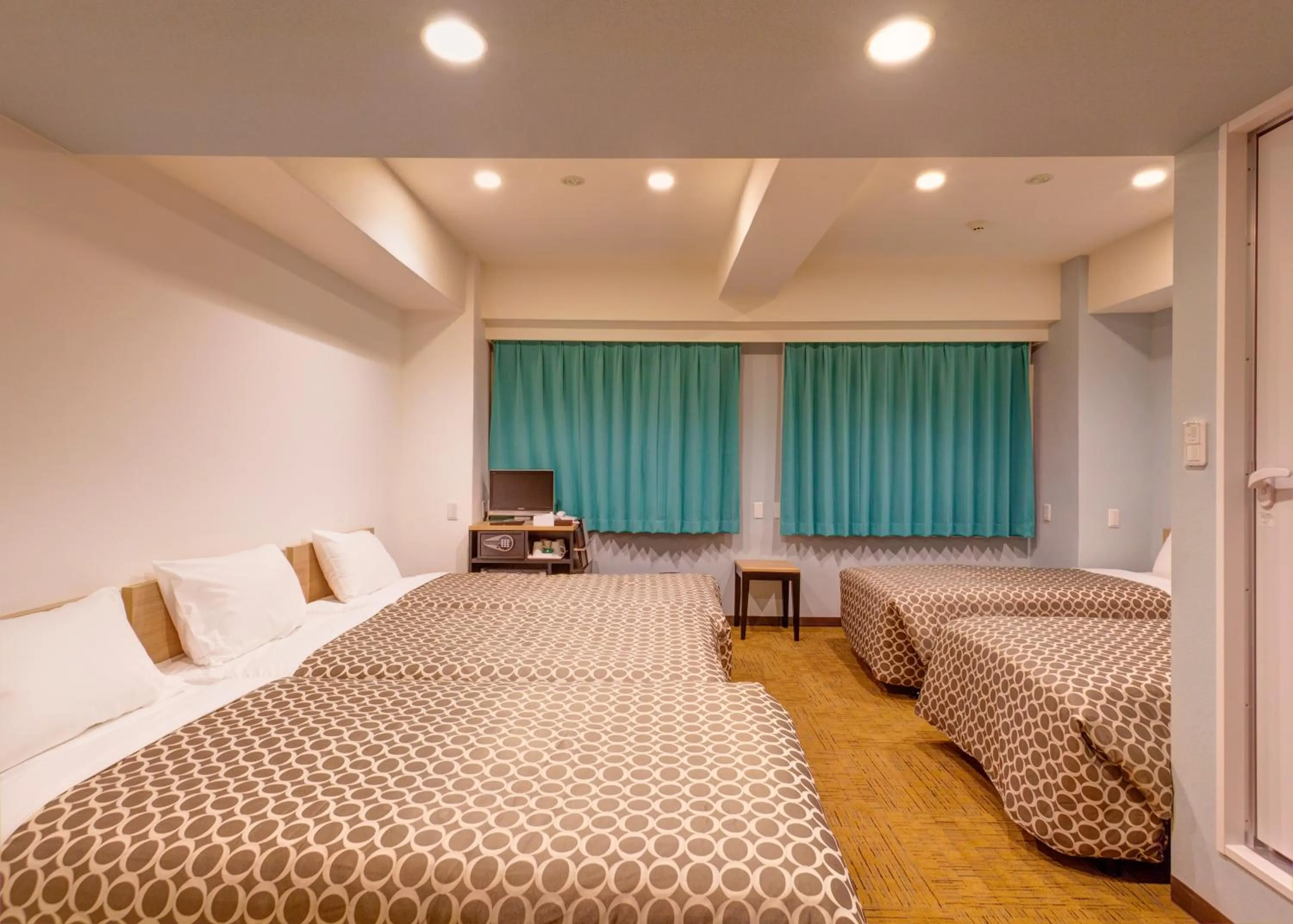 Photo of the whole room, Bed in Community & Spa Naha Central Hotel