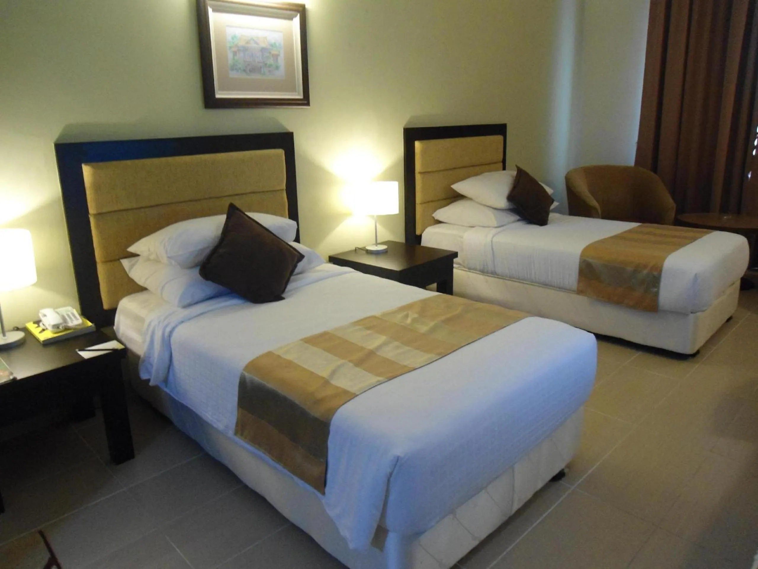 Bed in Puteri Bay Hotel