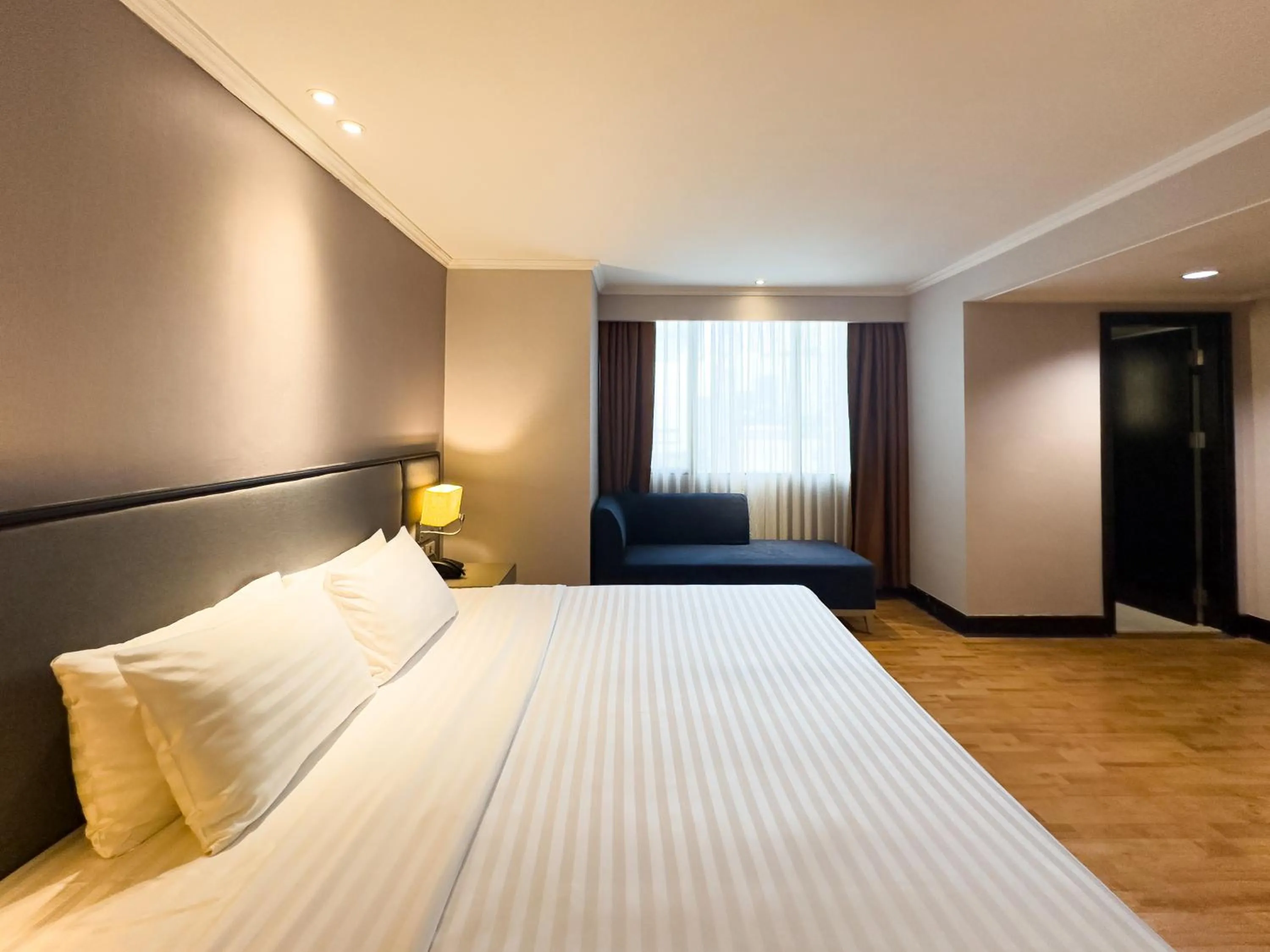 Bed in Rembrandt Residences Bangkok