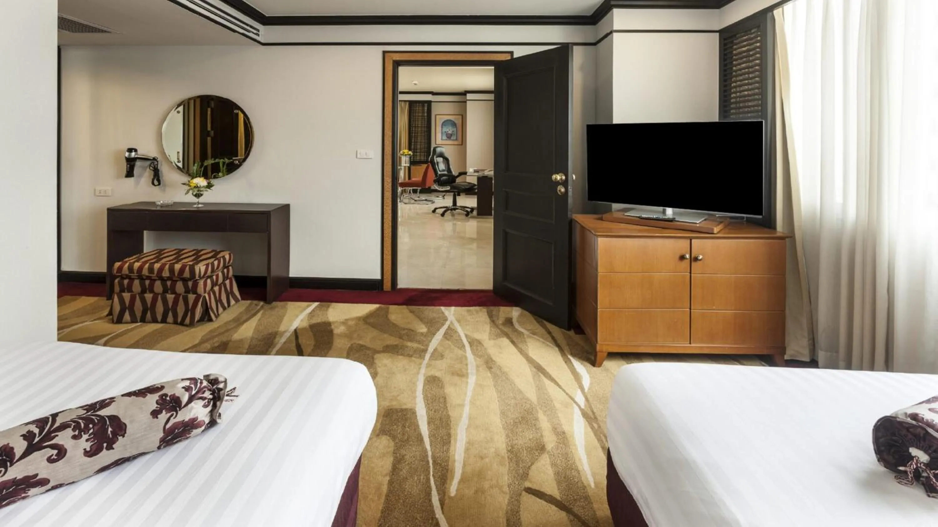 Bed in Rembrandt Residences Bangkok