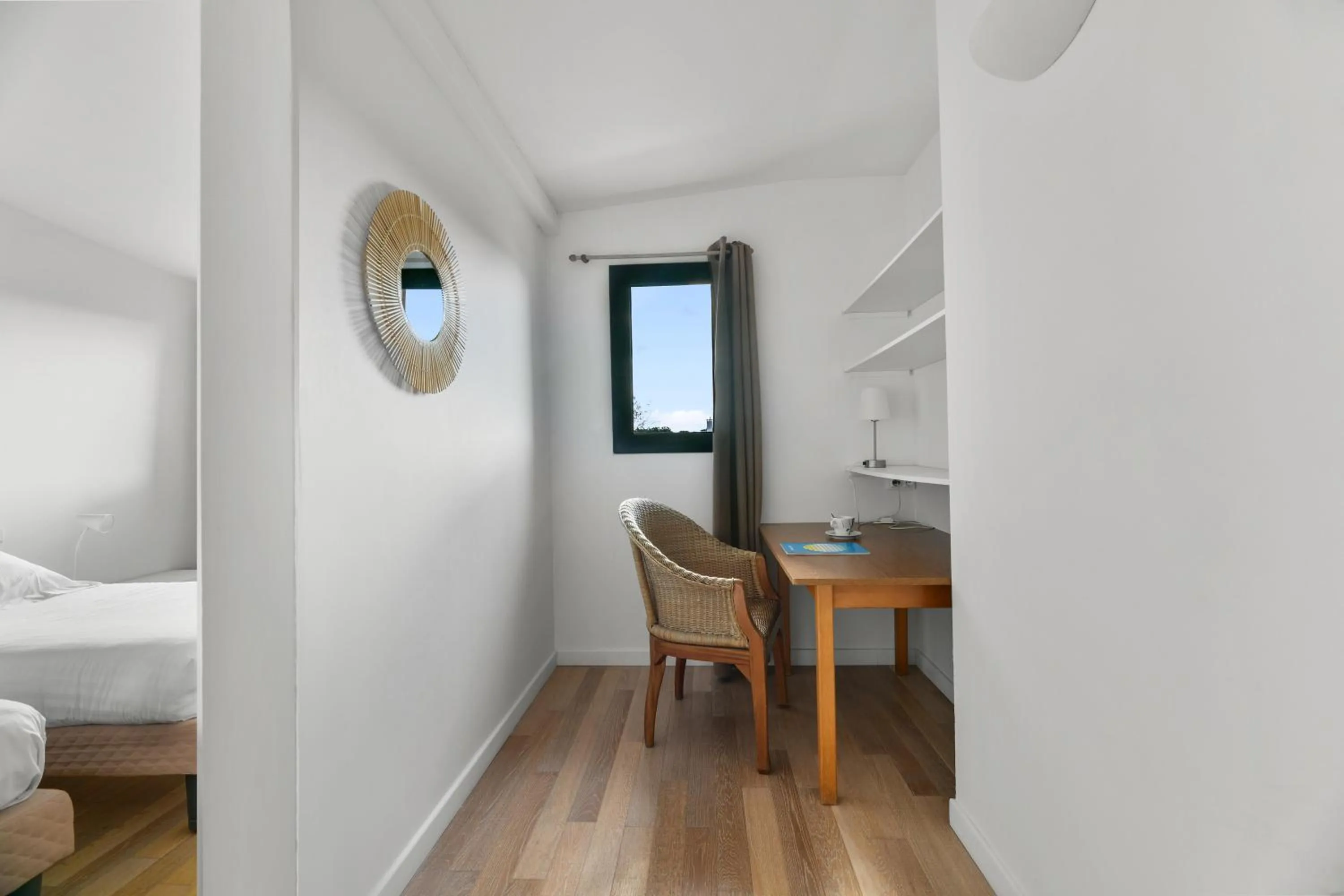 Seating area, Bed in Hotel Le Pavillon Bleu