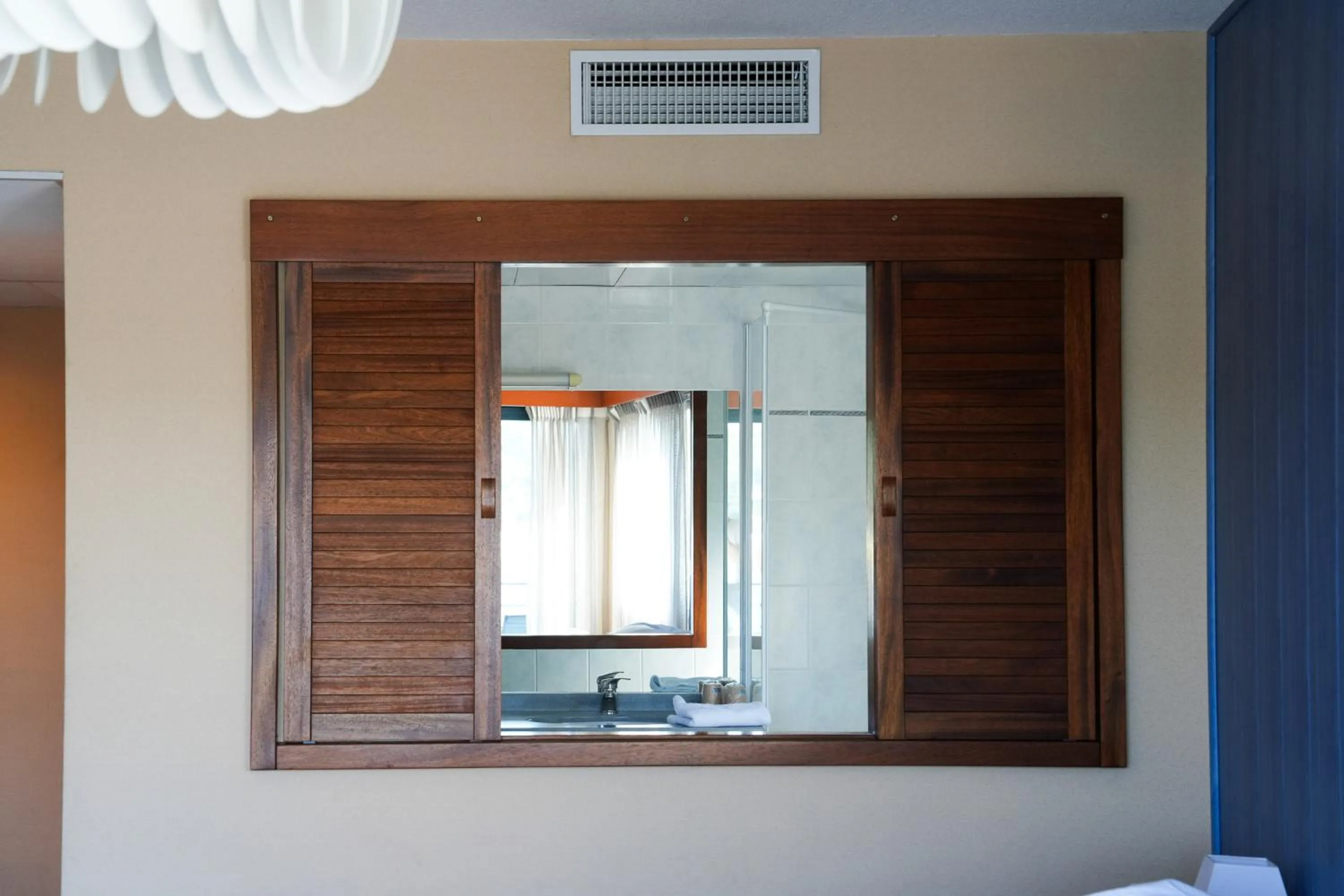Bedroom in Hotel Le Pavillon Bleu