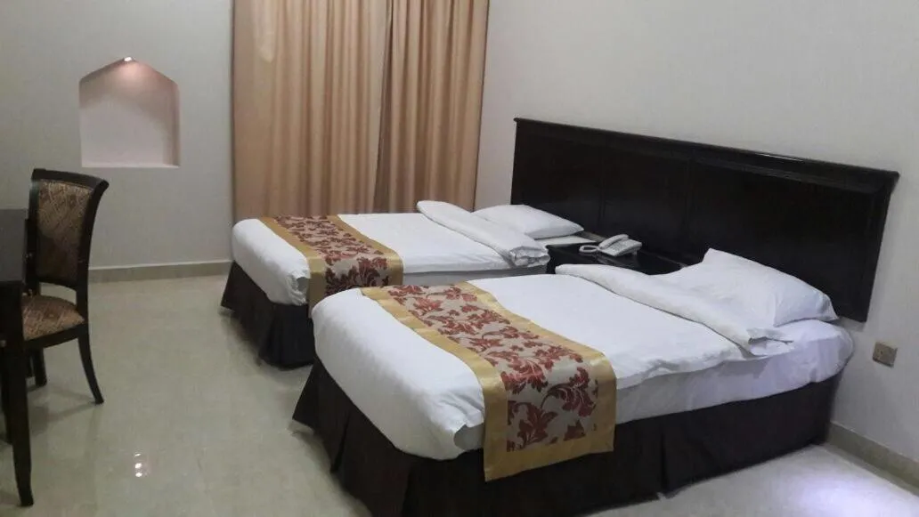 Bed in Gulf Crown Hotel Apartment