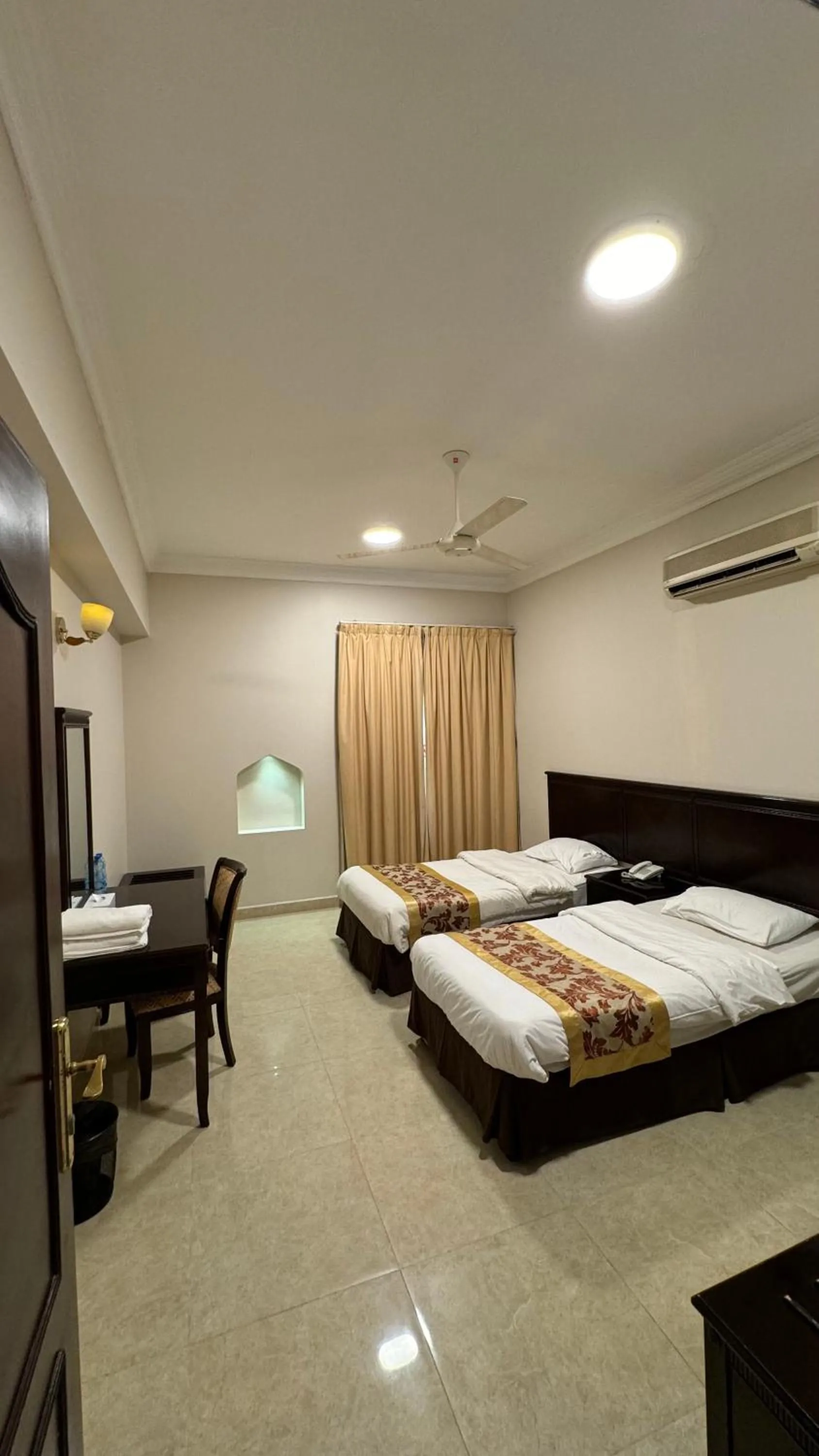 Bed in Gulf Crown Hotel Apartment