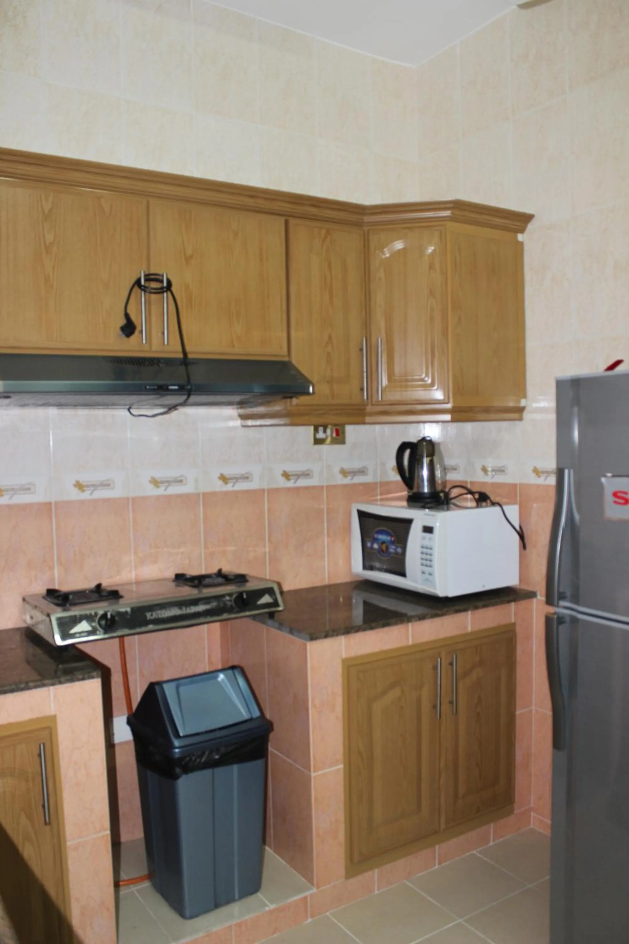 Kitchen or kitchenette in Gulf Crown Hotel Apartment