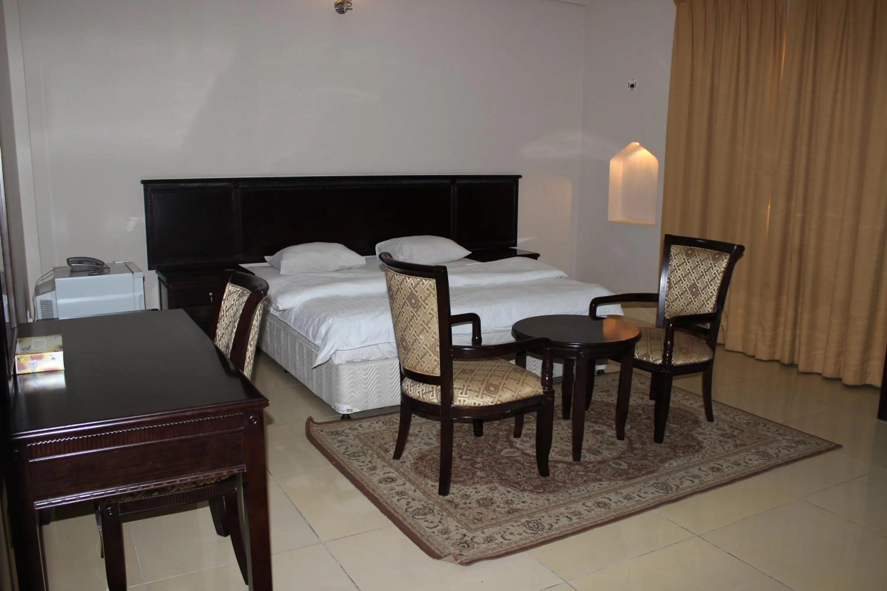 Photo of the whole room, Bed in Gulf Crown Hotel Apartment