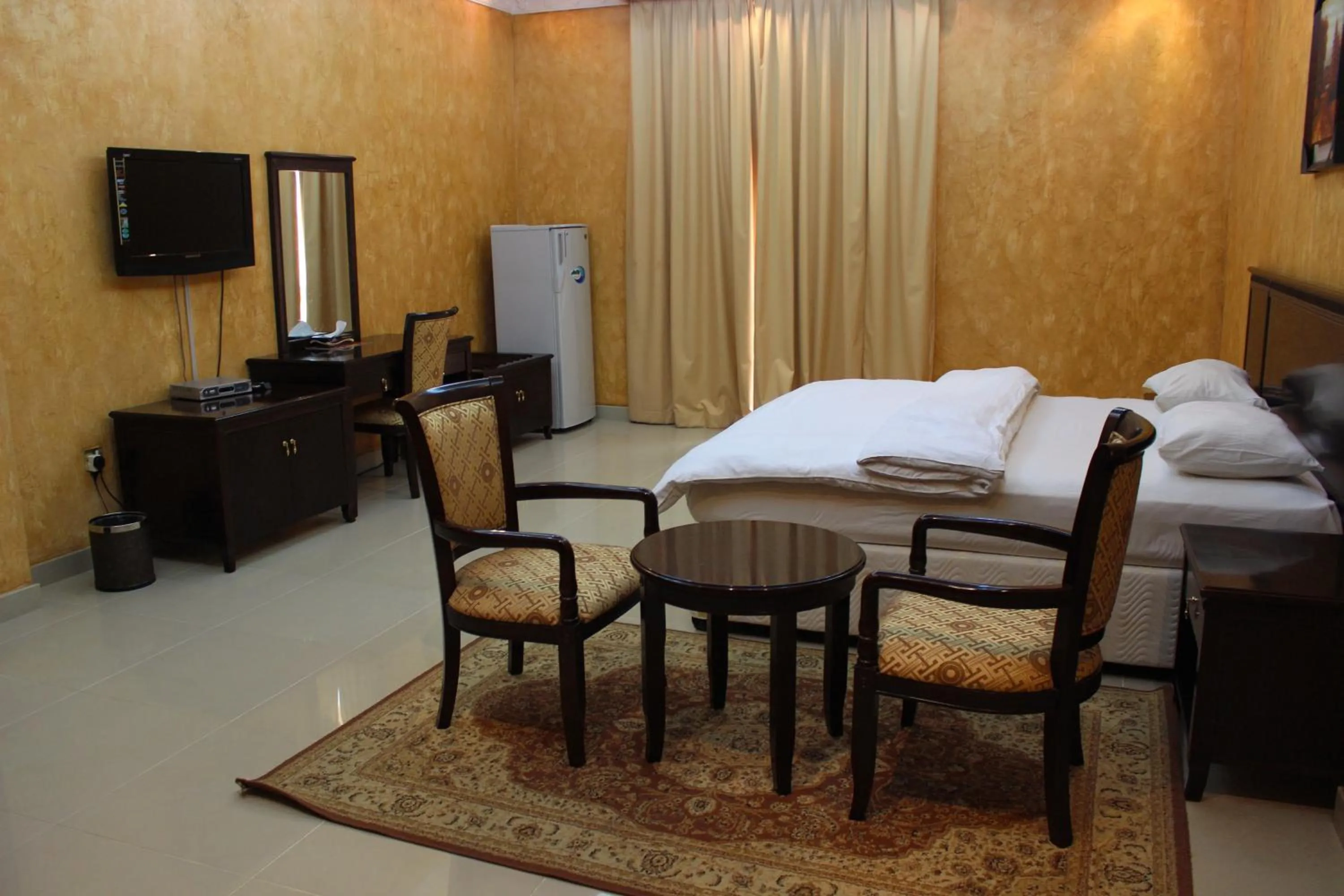 Photo of the whole room, Bed in Gulf Crown Hotel Apartment