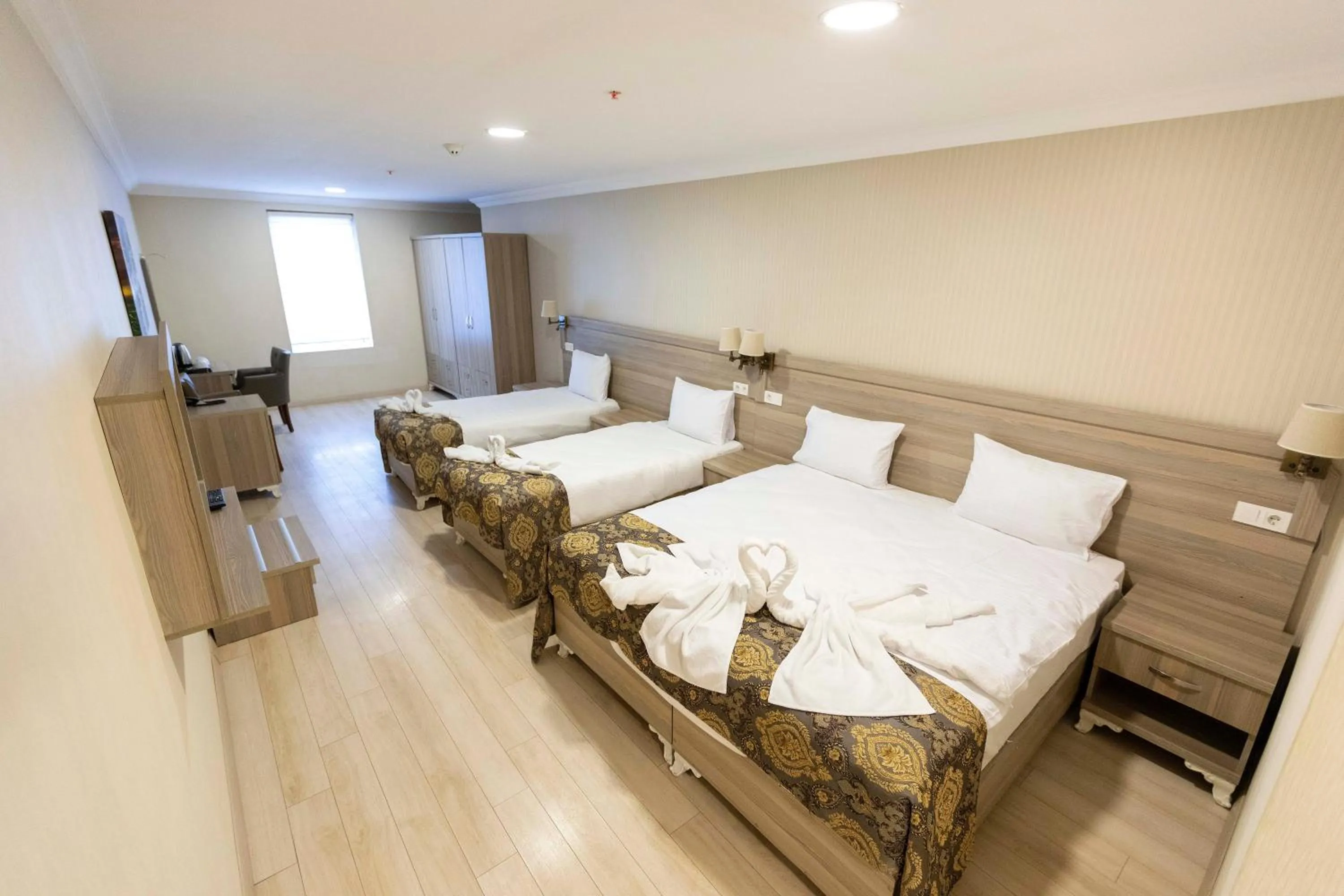 Bed in World Point Hotel Besyol