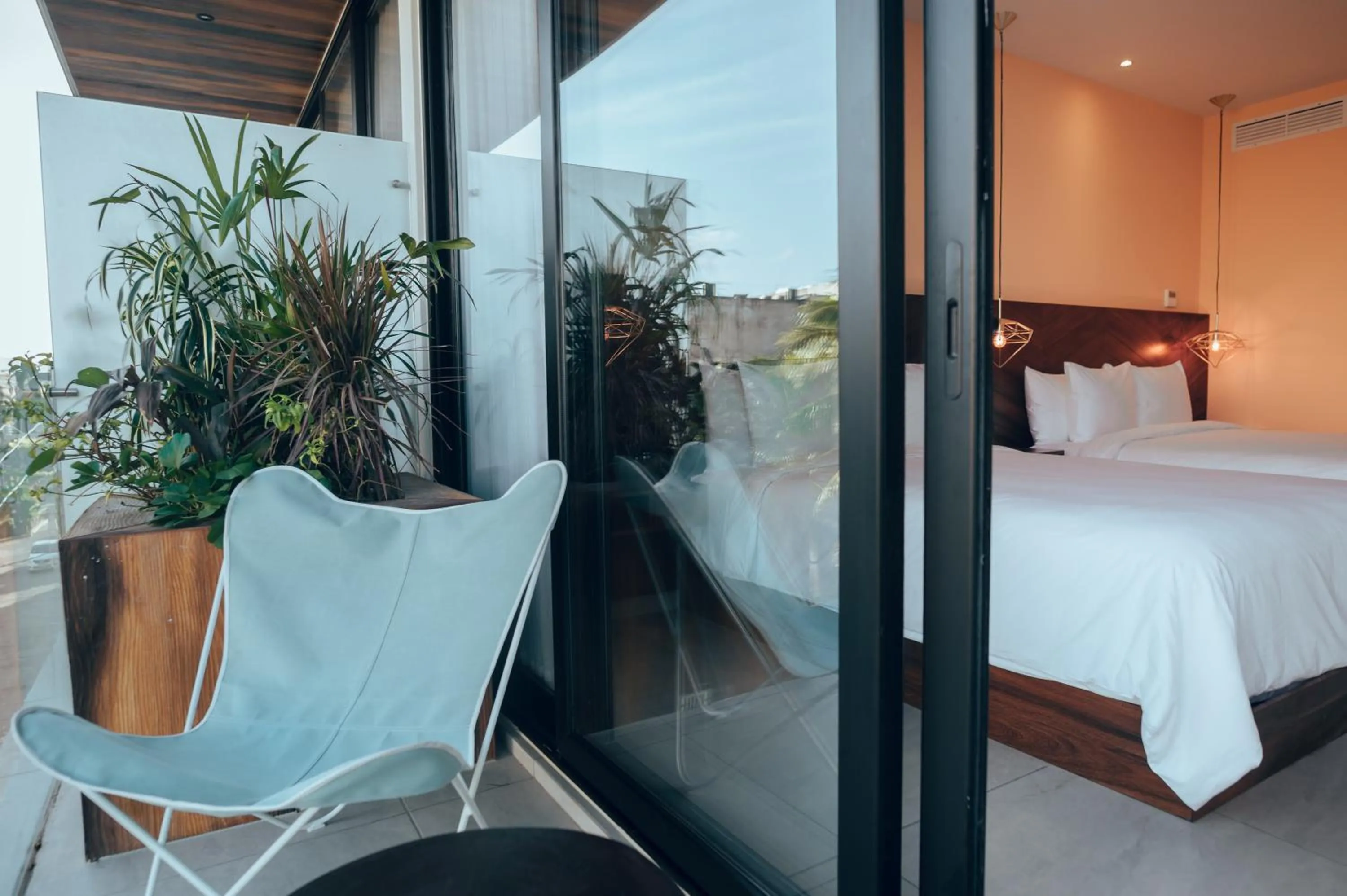 Balcony/Terrace, Bed in CALIXTA Hotel