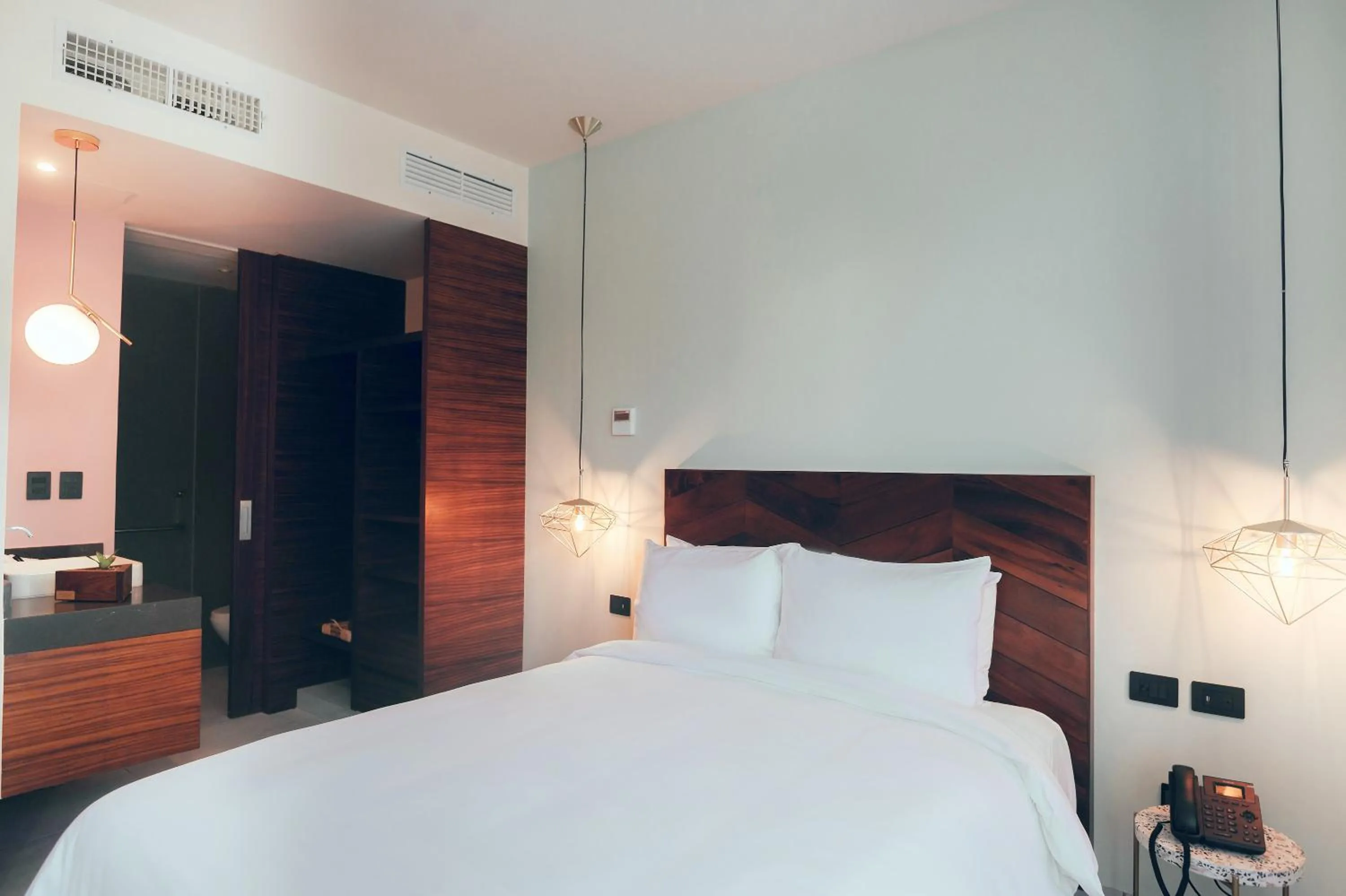 Bed in CALIXTA Hotel