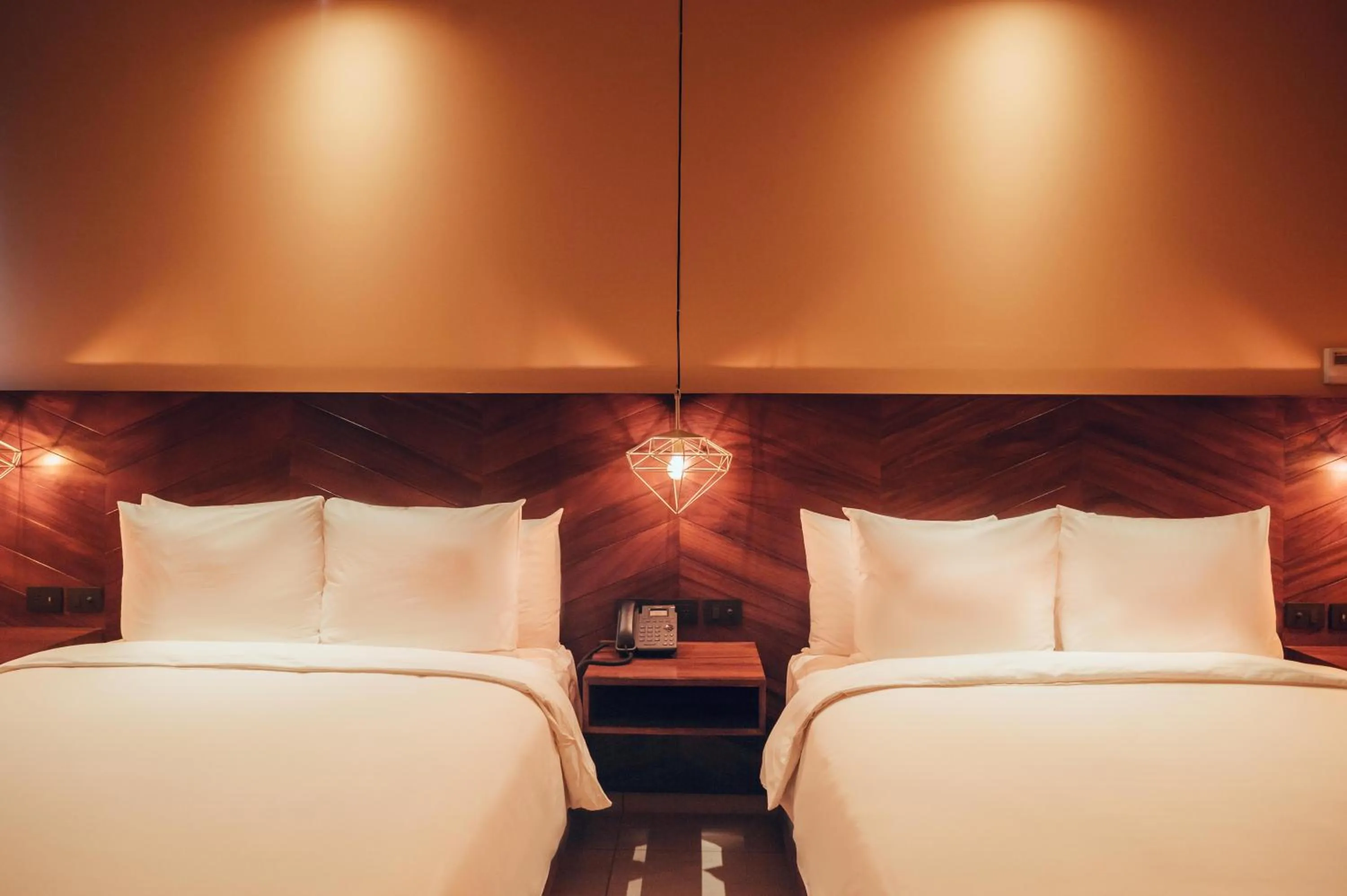 Bed in CALIXTA Hotel