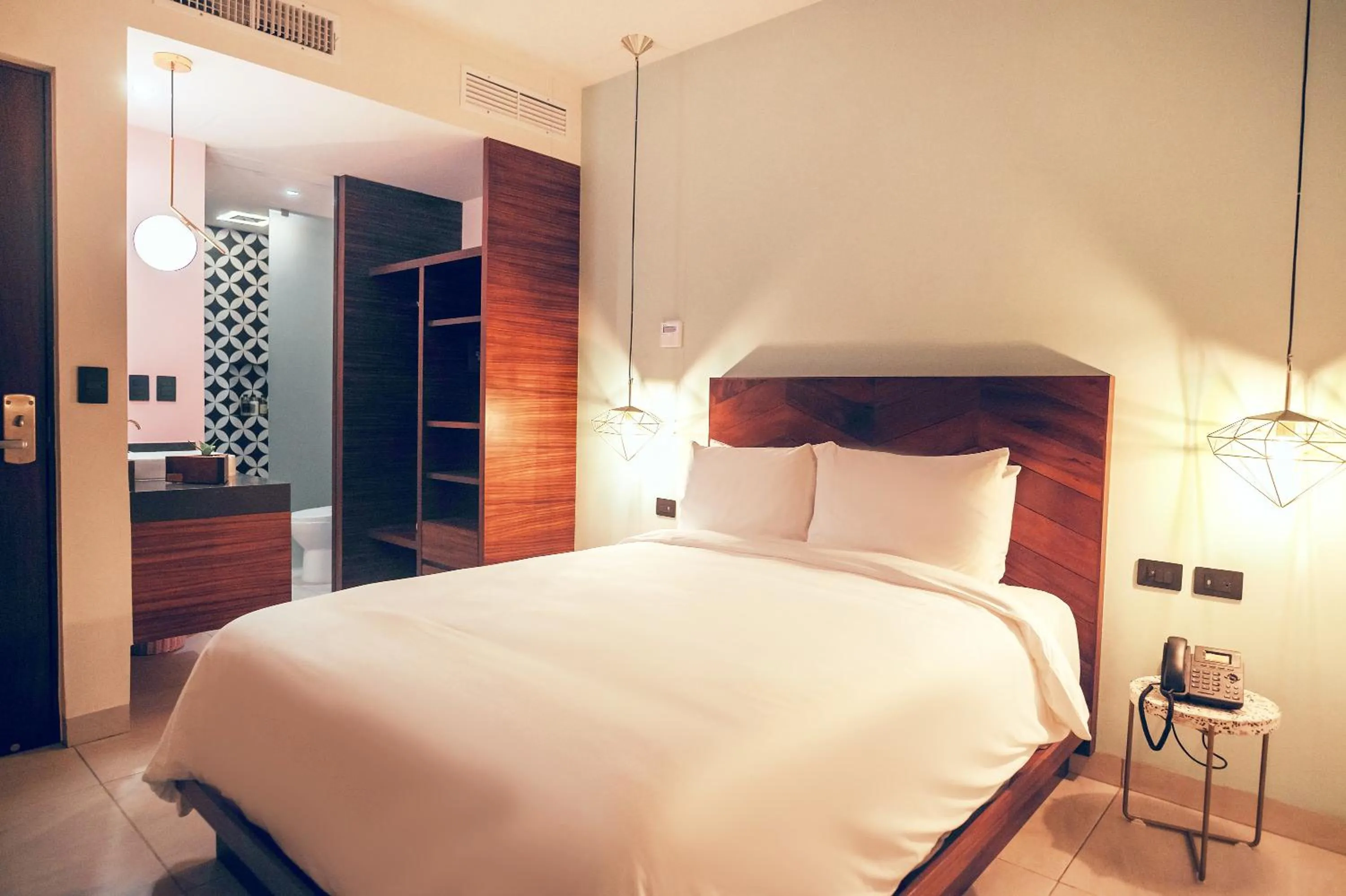 Bed in CALIXTA Hotel