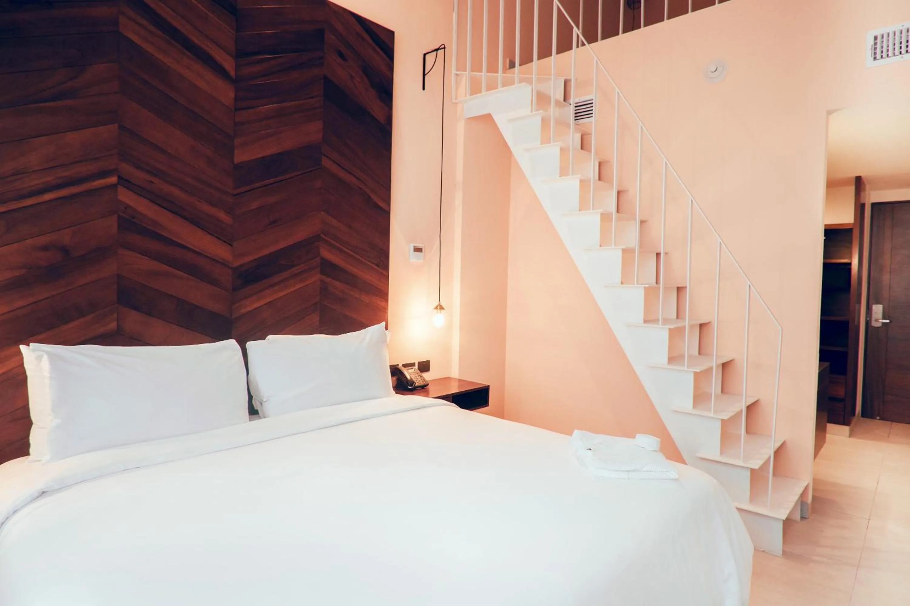 Bed in CALIXTA Hotel