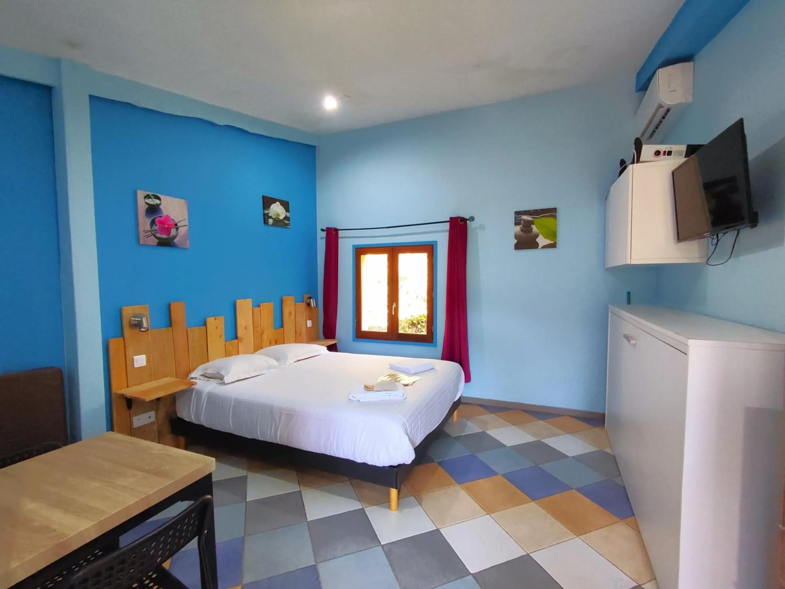Deluxe Room (2 Adults + 1 Child) - single occupancy in La Maison de Tari Deluxe Room (2 Adults + 1 Child) - single occupancy in La Maison de Tari