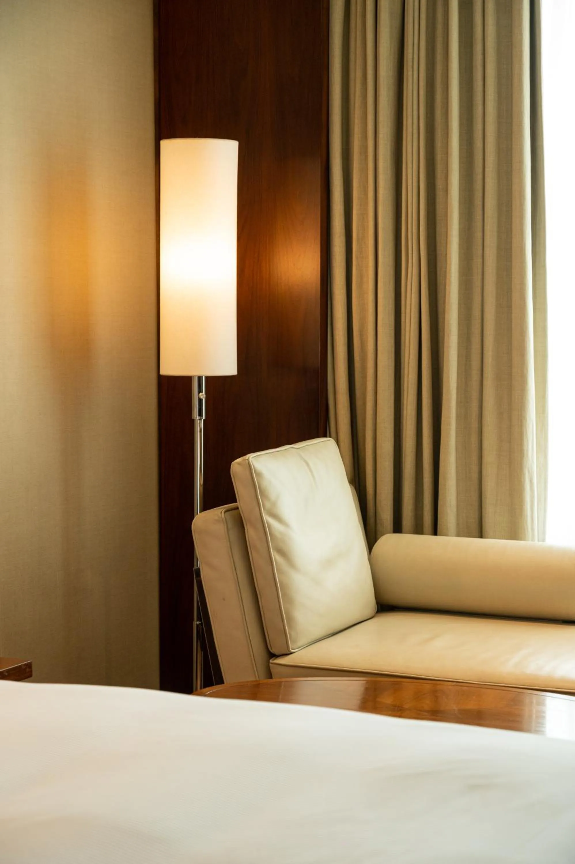 Seating area, Bed in DoubleTree by Hilton-Pune Chinchwad