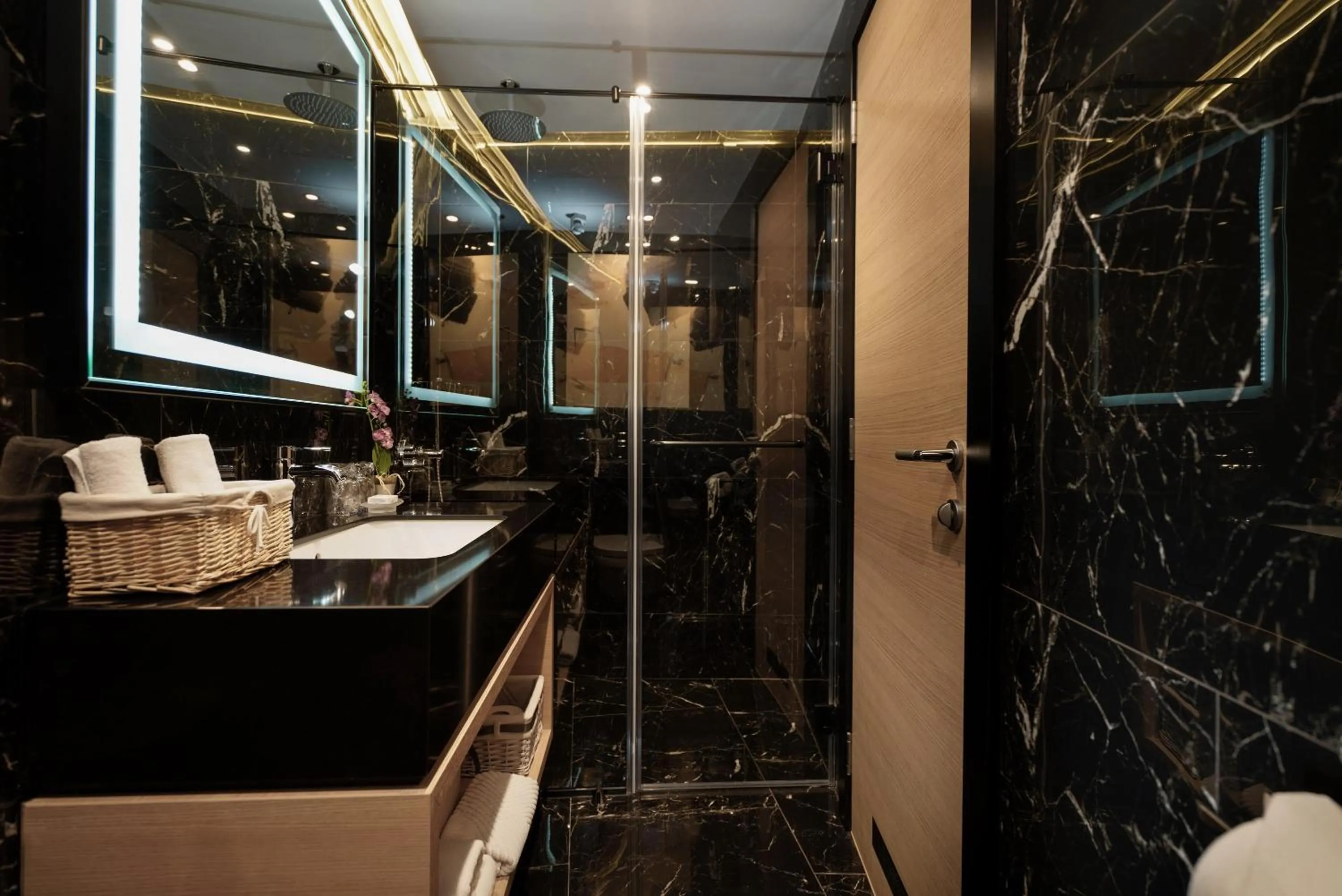 Shower in Maccani Black Luxury Suites