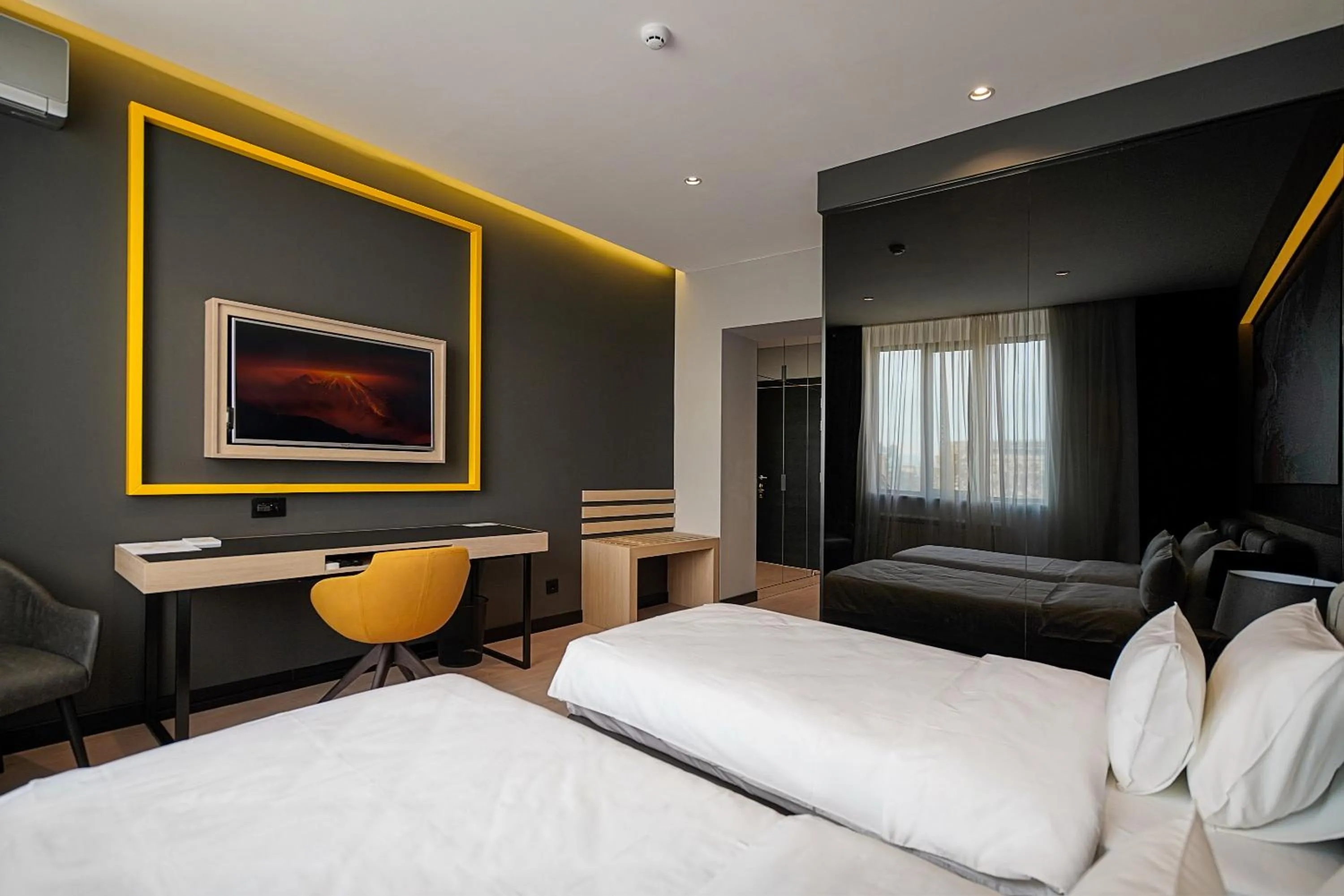Bed in Maccani Black Luxury Suites