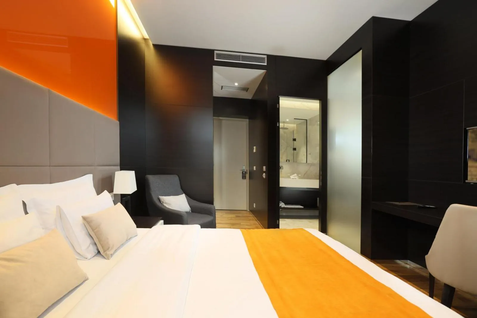 Bed in Maccani Black Luxury Suites