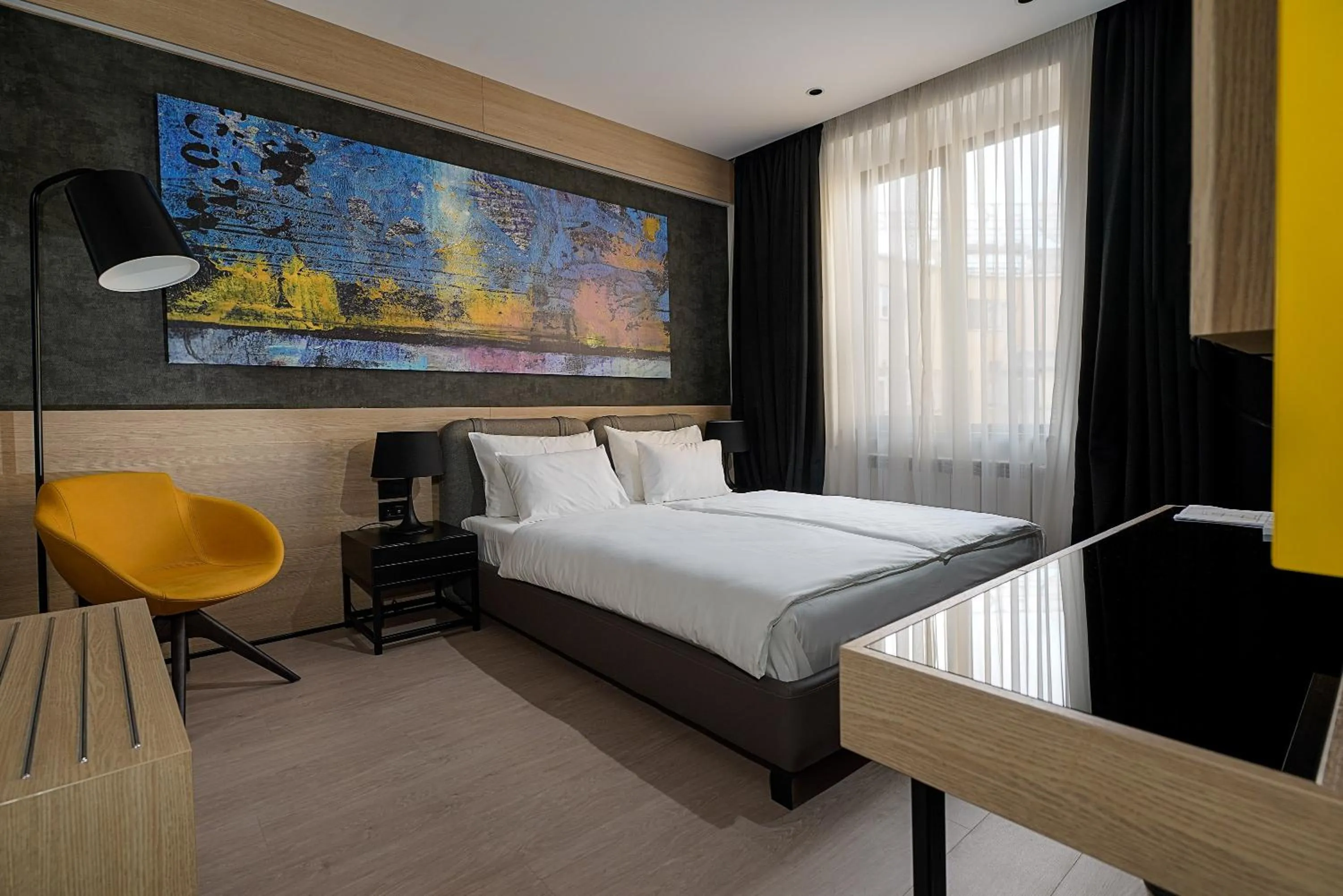 Bed in Maccani Black Luxury Suites