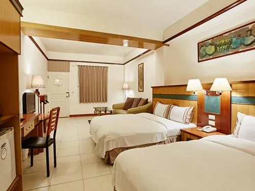Bed in Rainbow Resort Hotel