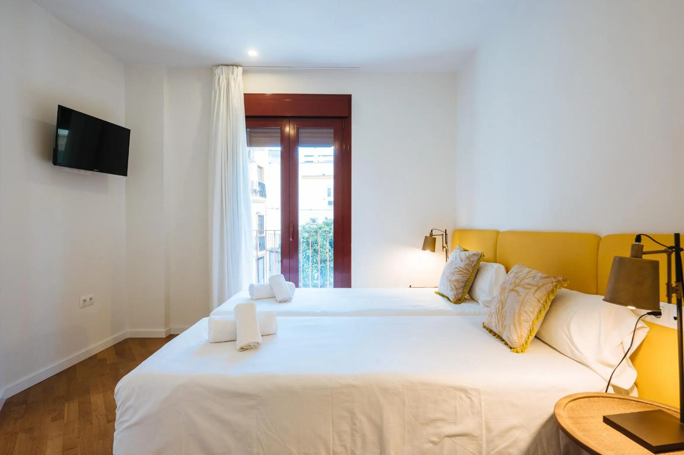 Bed in The Zentral Suites & Apartments