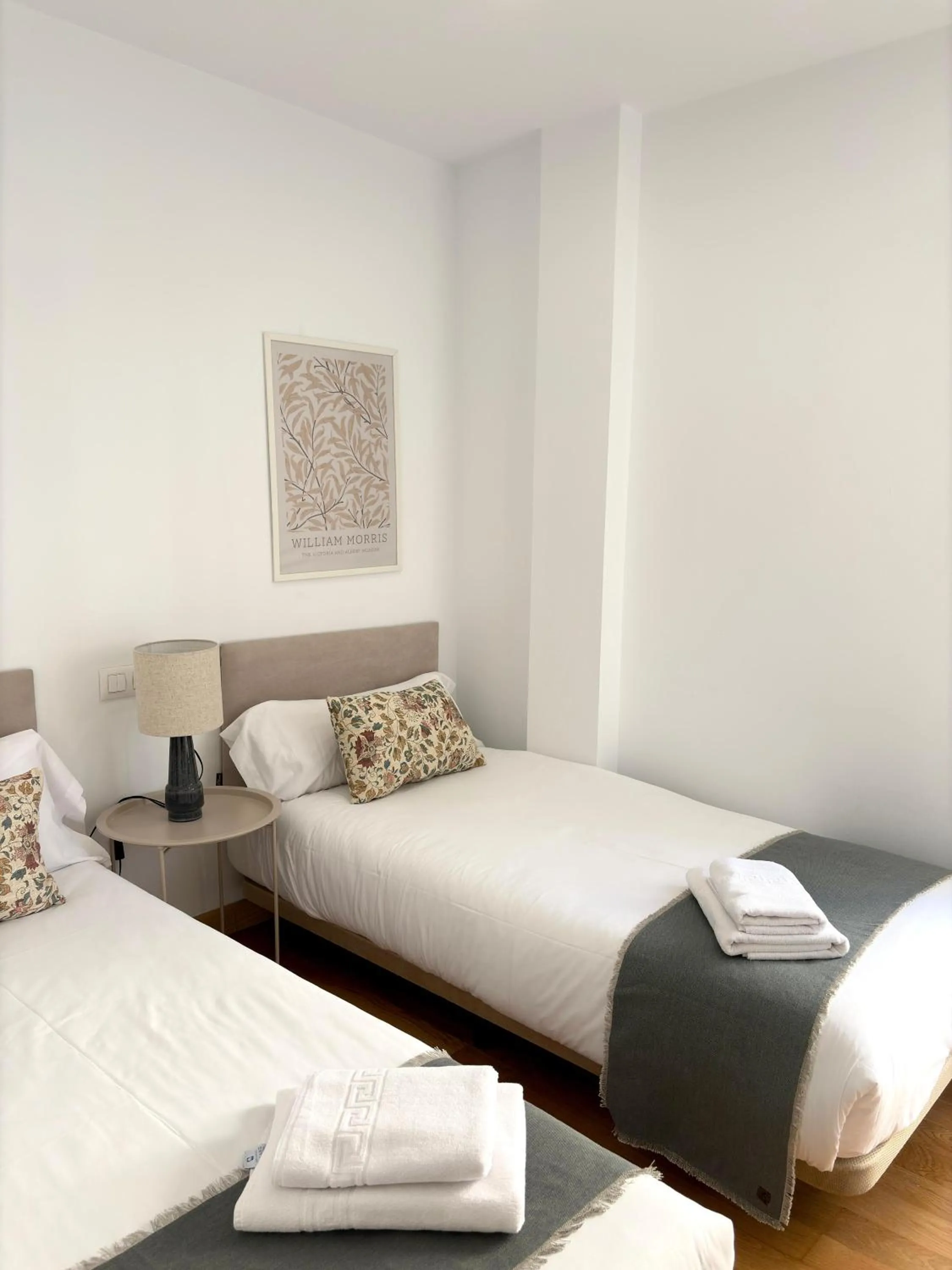 Bed in The Zentral Suites & Apartments