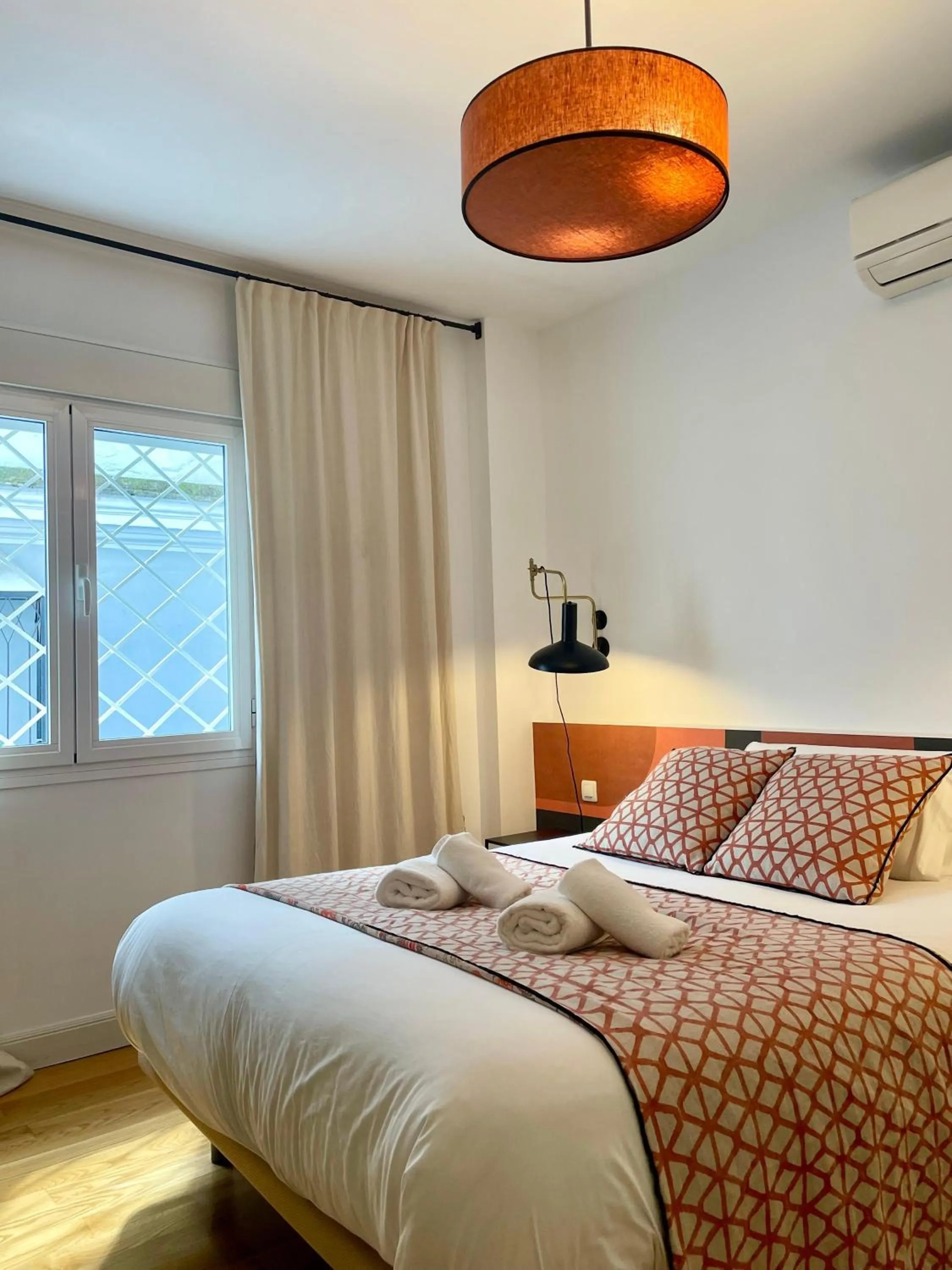 Bed in The Zentral Suites & Apartments