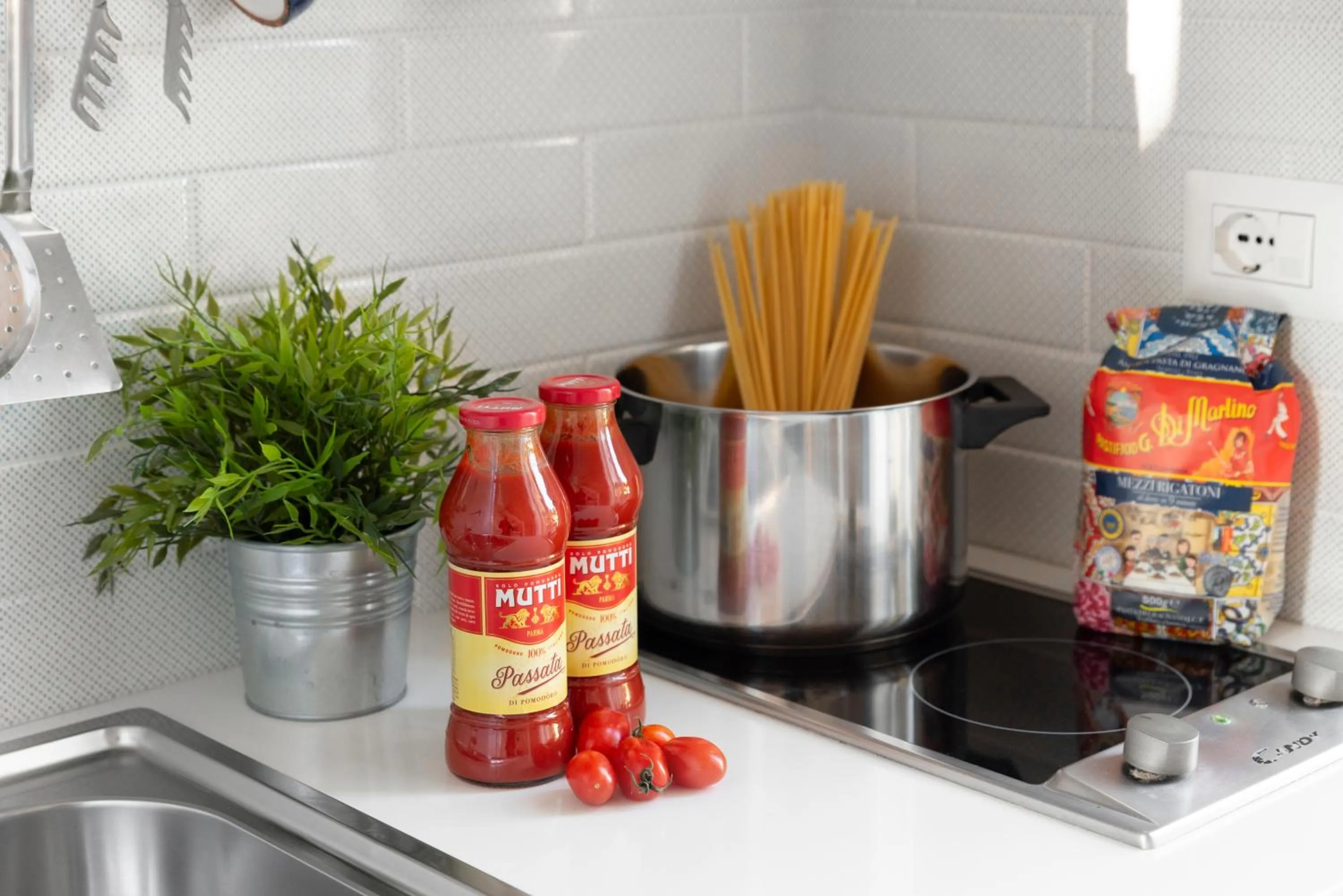 kitchen in Al Centro Suites