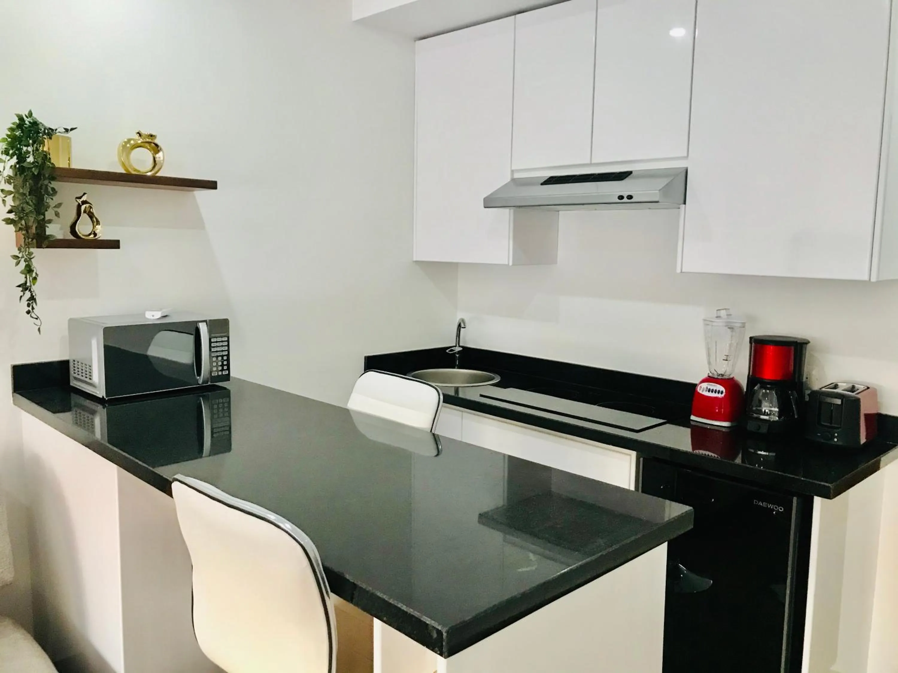 Kitchen or kitchenette in Edificio Vanessa 24 studios