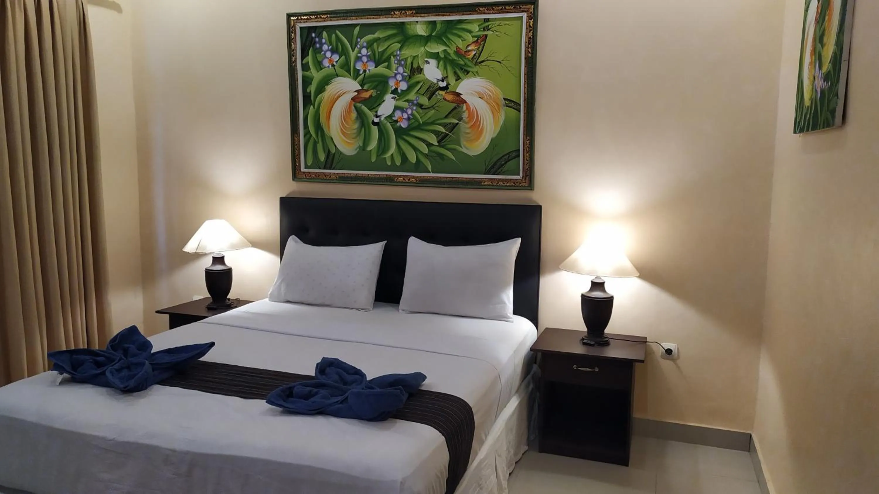 Bed in Kusuka Bungalow