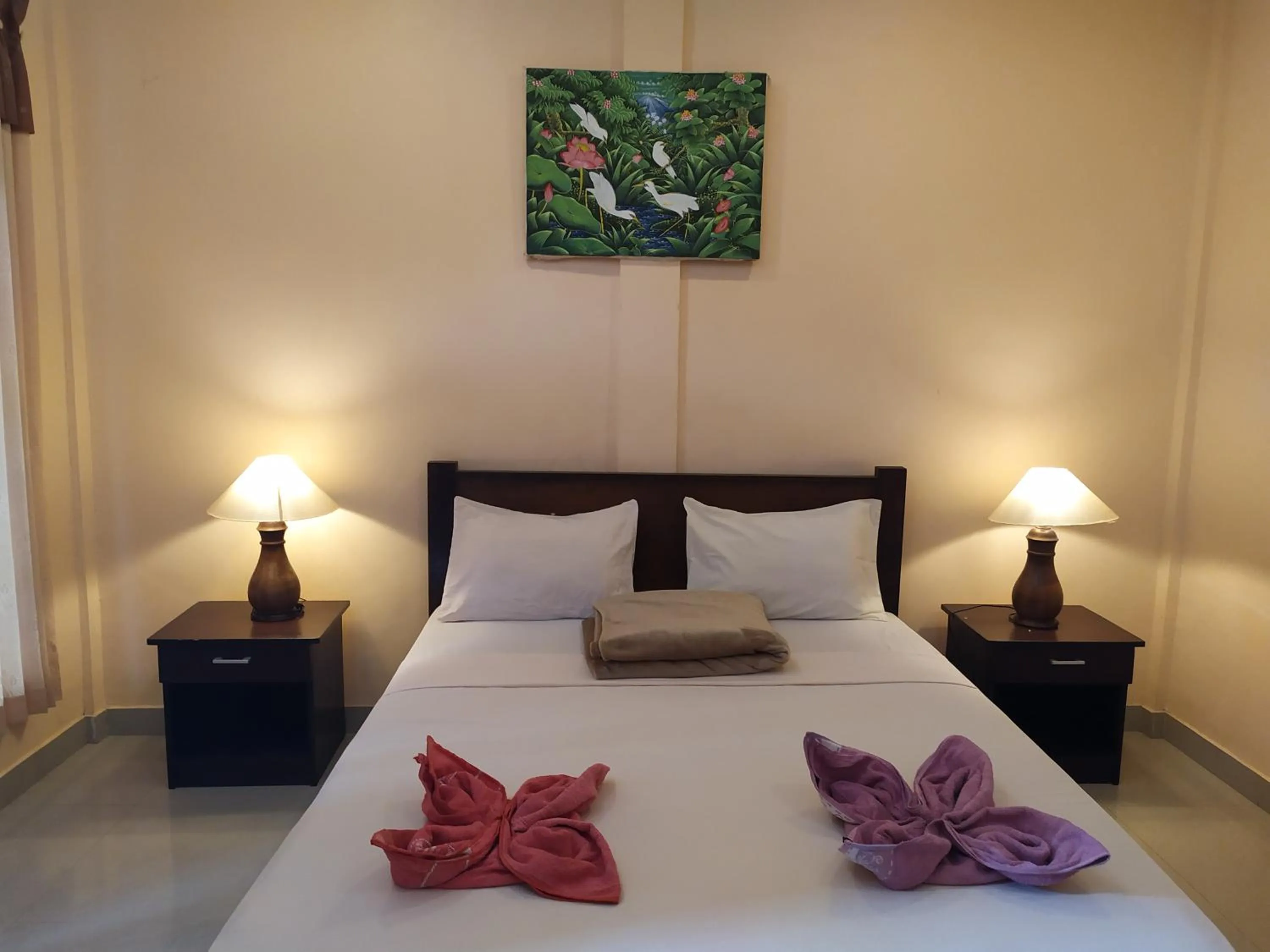 Bed in Kusuka Bungalow