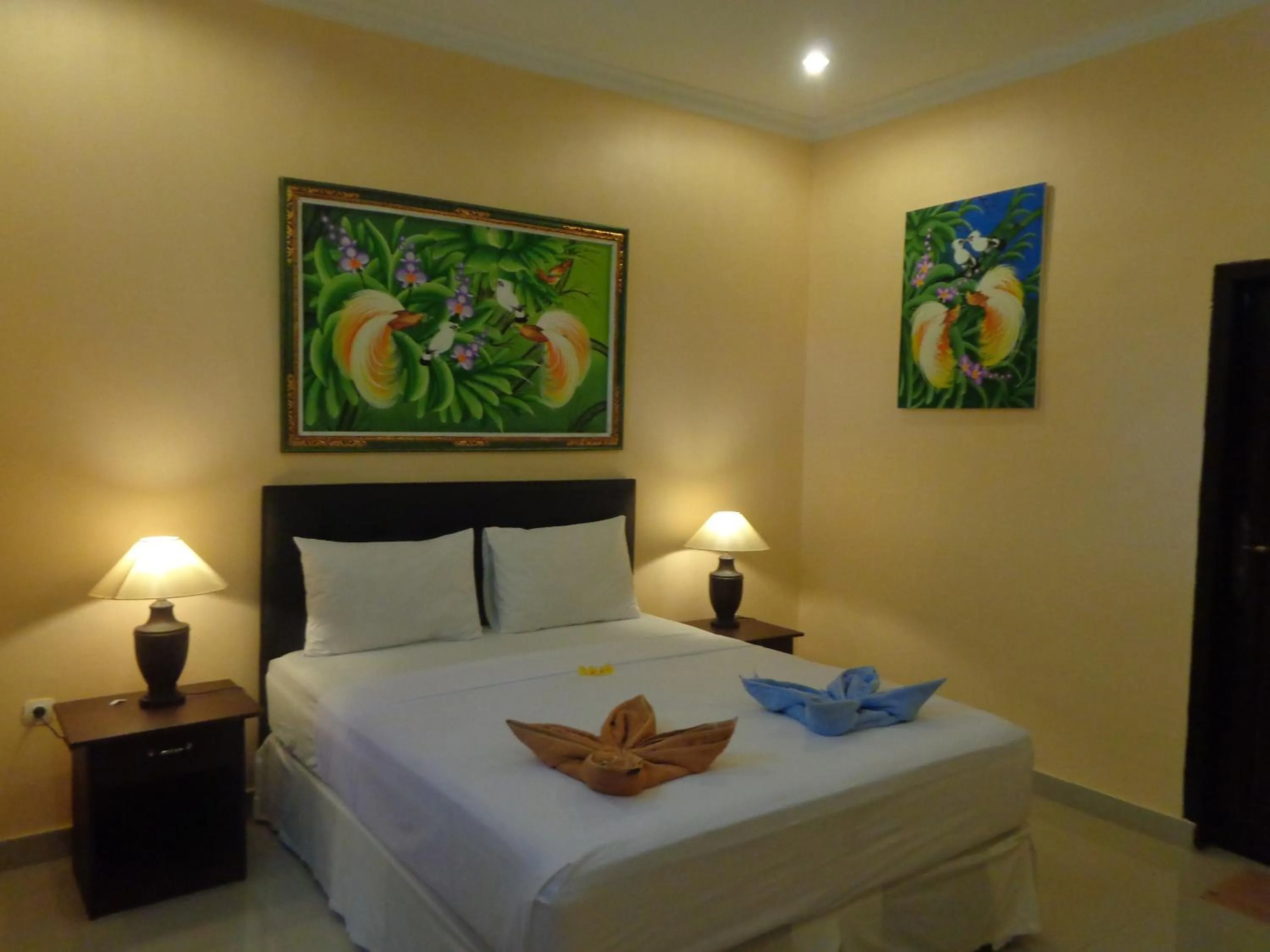 Bed in Kusuka Bungalow