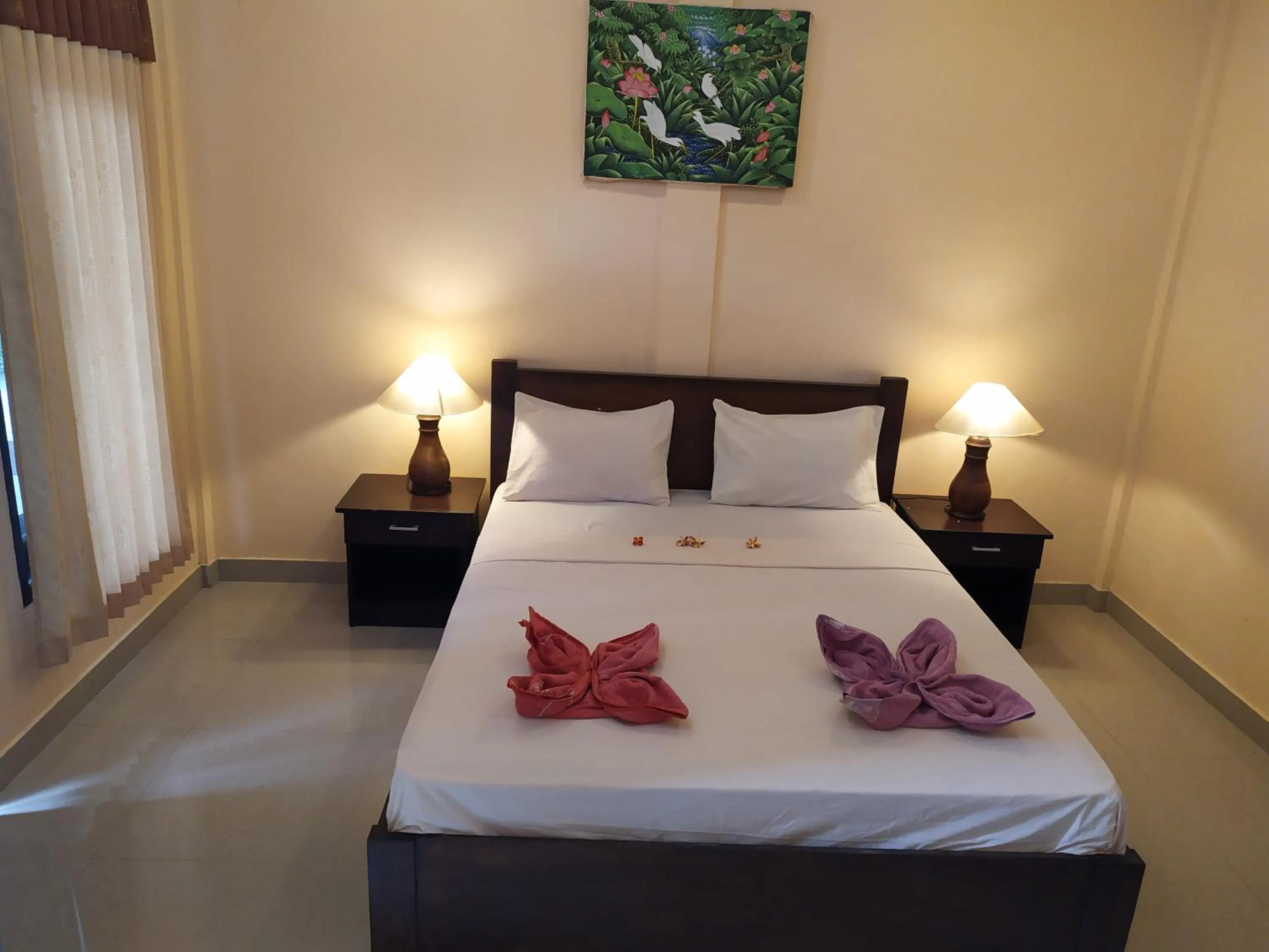 Bed in Kusuka Bungalow