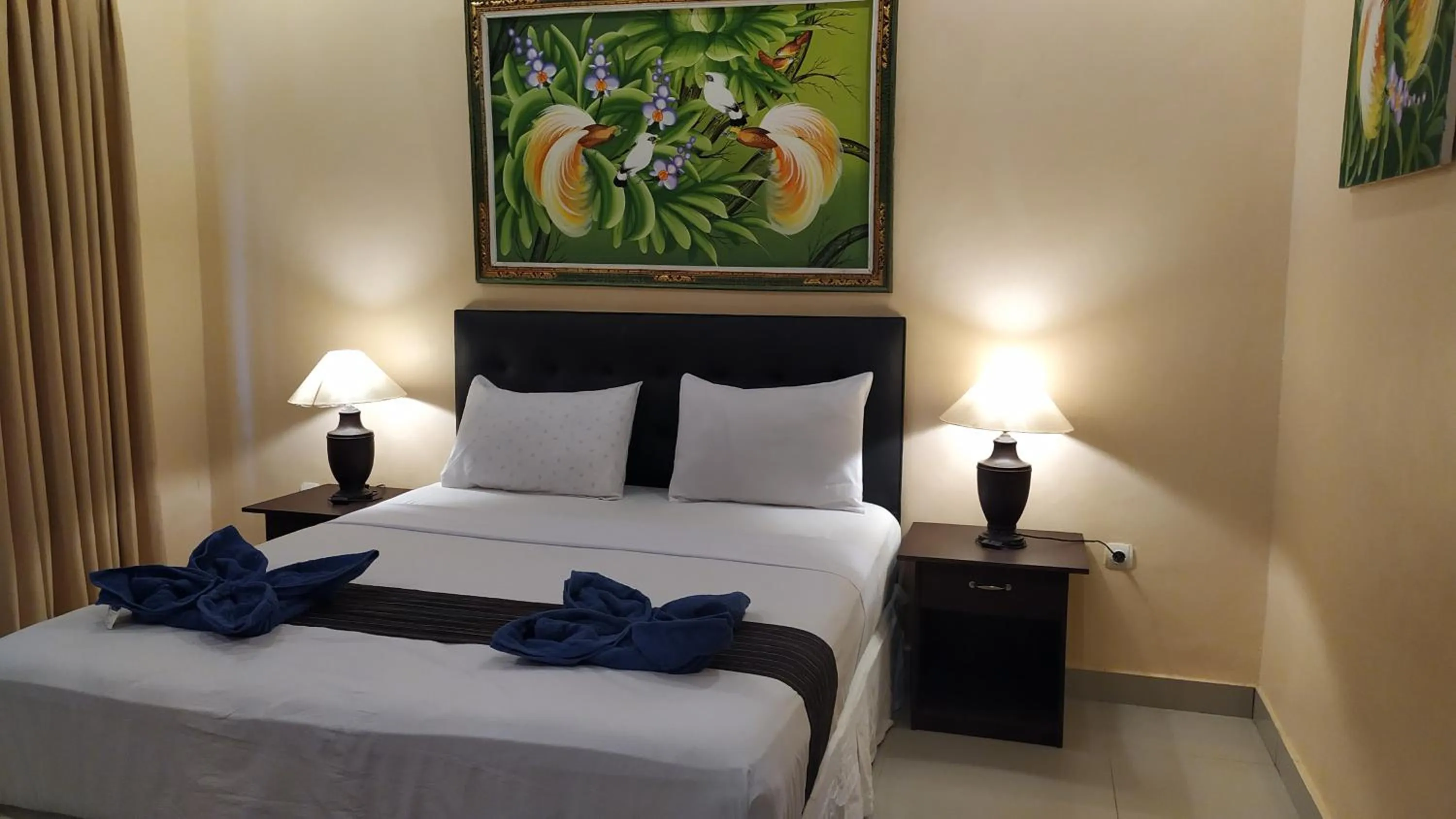 Bed in Kusuka Bungalow