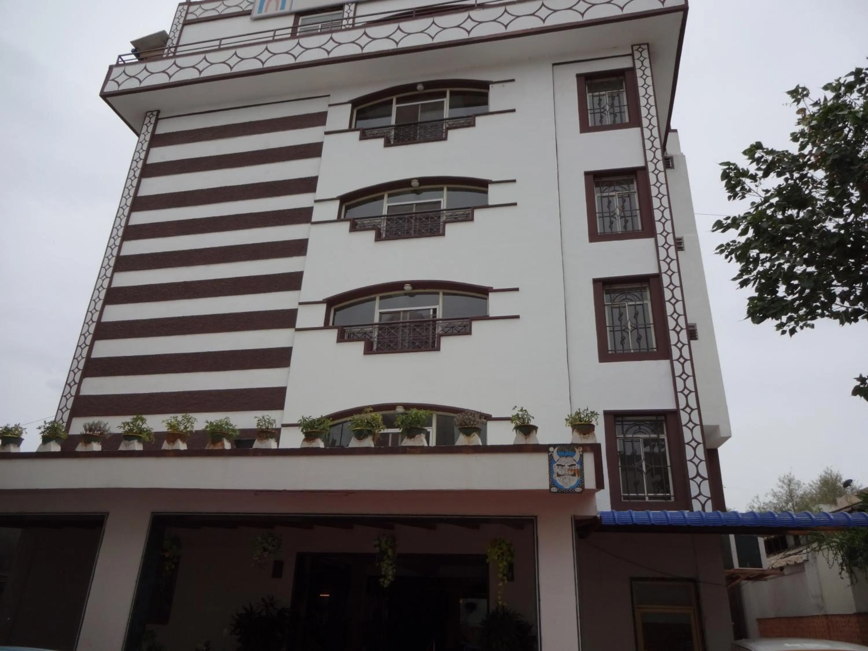 Property building in Hotel Nahar Manchester Inn