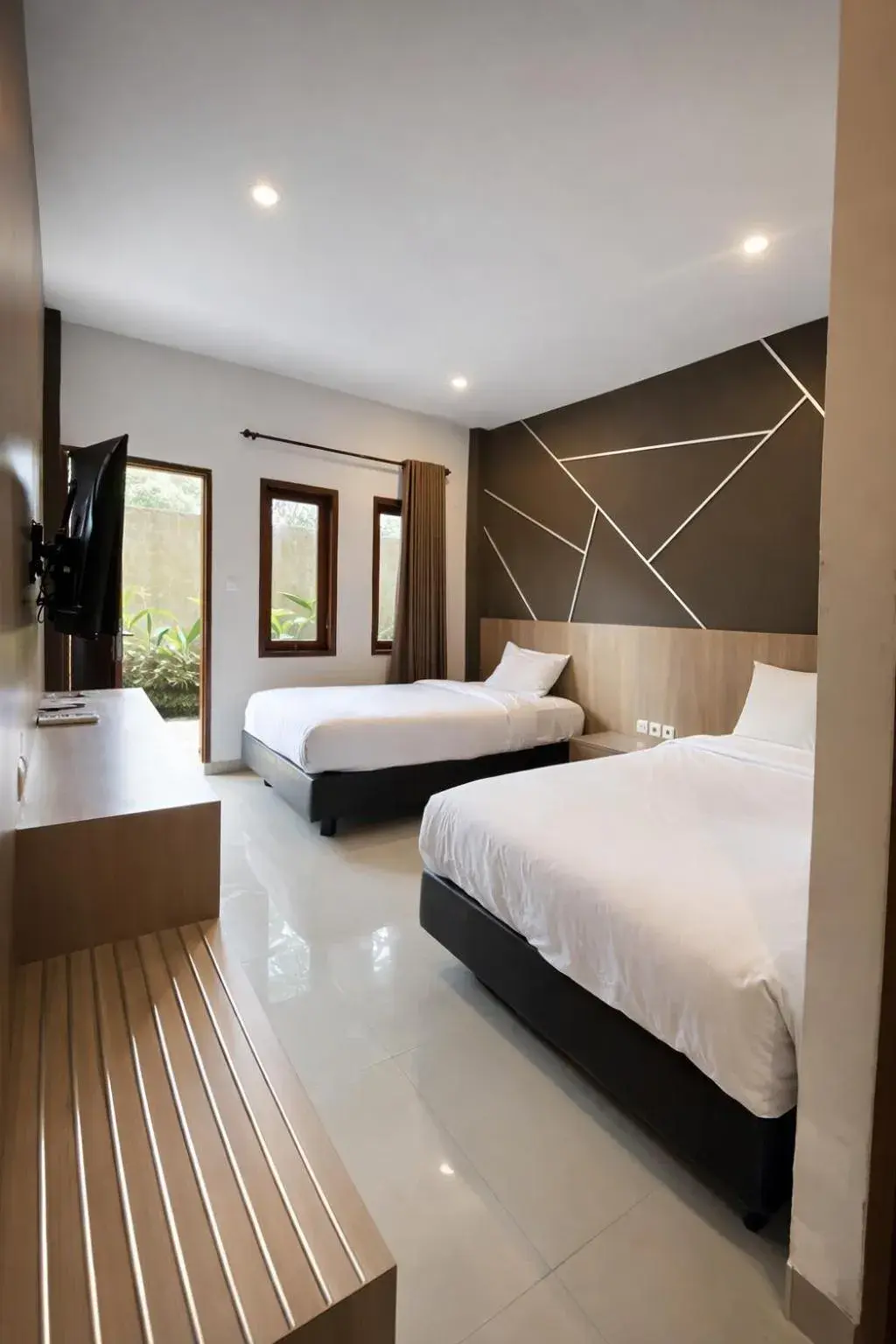 Bed in Grand Kuta Hotel Lombok - Pool - 43 inch Google TV - Strong 60Mbps WiFi - New Enhanced Management Bed in Grand Kuta Hotel Lombok - Pool - 43 inch Google TV - Strong 60Mbps WiFi - New Enhanced Management
