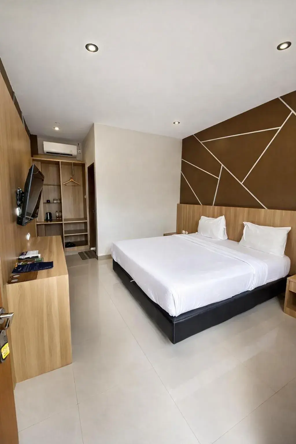 Bed in Grand Kuta Hotel Lombok - Pool - 43 inch Google TV - Strong 60Mbps WiFi - New Enhanced Management Bed in Grand Kuta Hotel Lombok - Pool - 43 inch Google TV - Strong 60Mbps WiFi - New Enhanced Management