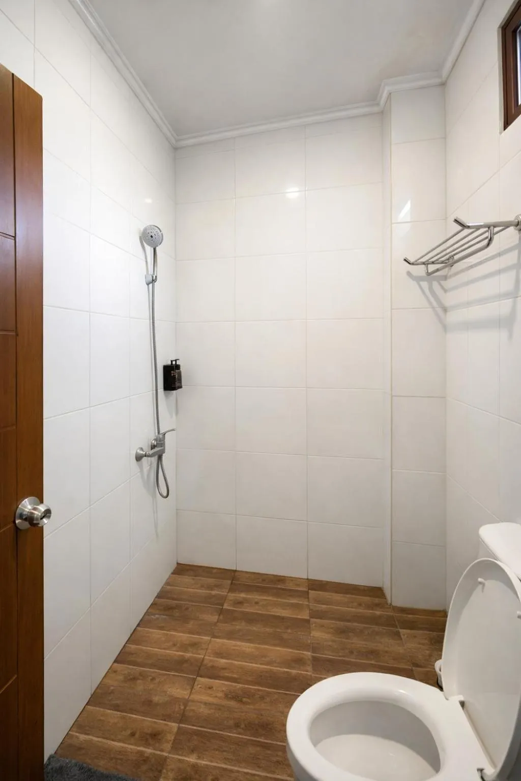 Shower in Grand Kuta Hotel Lombok - Pool - 43 inch Google TV - Strong 60Mbps WiFi - New Enhanced Management