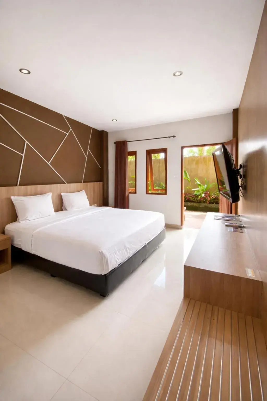 Bed in Grand Kuta Hotel Lombok - Pool - 43 inch Google TV - Strong 60Mbps WiFi - New Enhanced Management Bed in Grand Kuta Hotel Lombok - Pool - 43 inch Google TV - Strong 60Mbps WiFi - New Enhanced Management