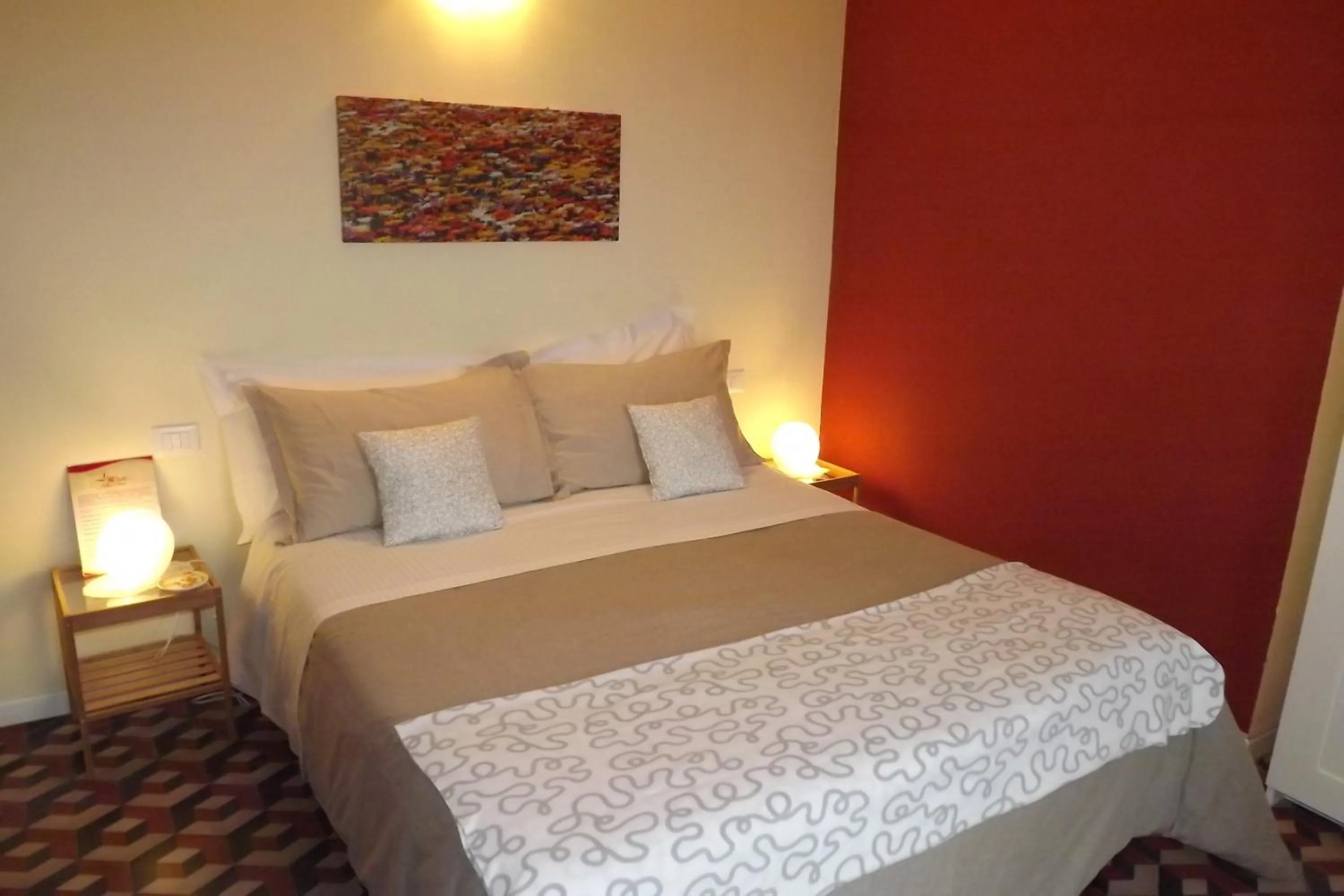 Bed in B&B Il Tempo Del Vento in front of the Castle