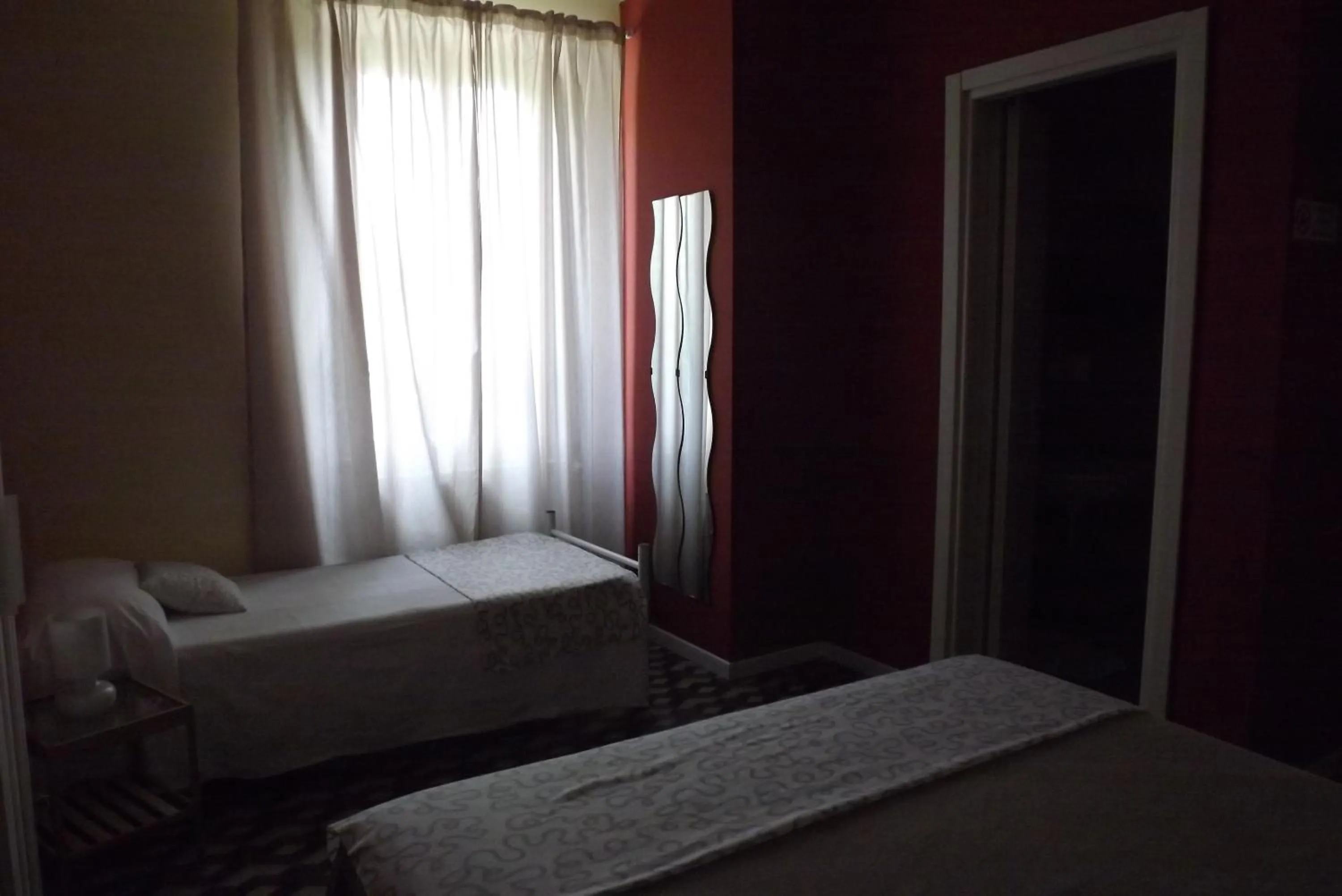 Bed in B&B Il Tempo Del Vento in front of the Castle