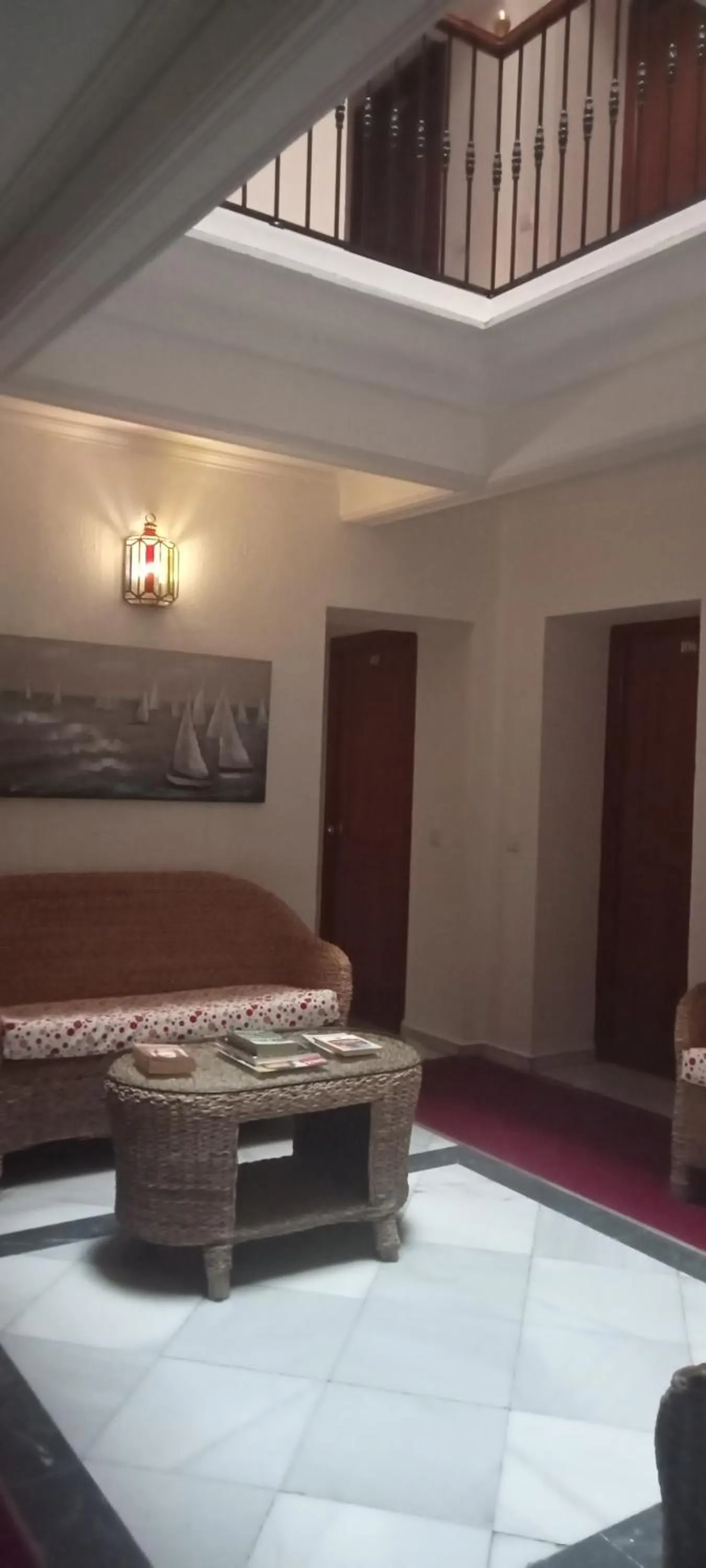 Communal lounge/ TV room, Bed in Hostal Bahía