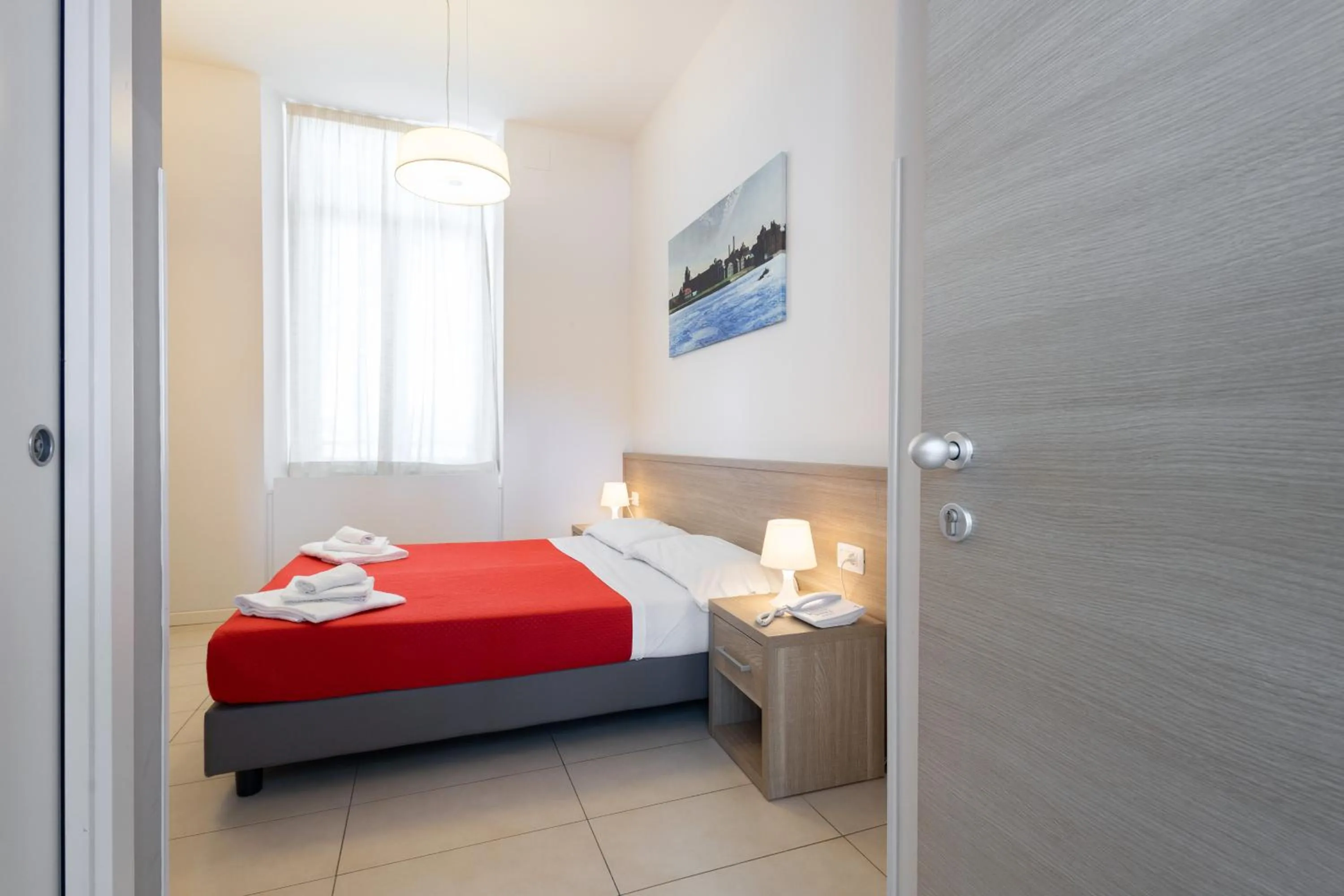 Photo of the whole room, Bed in San Luigi - Residenza Gemelli