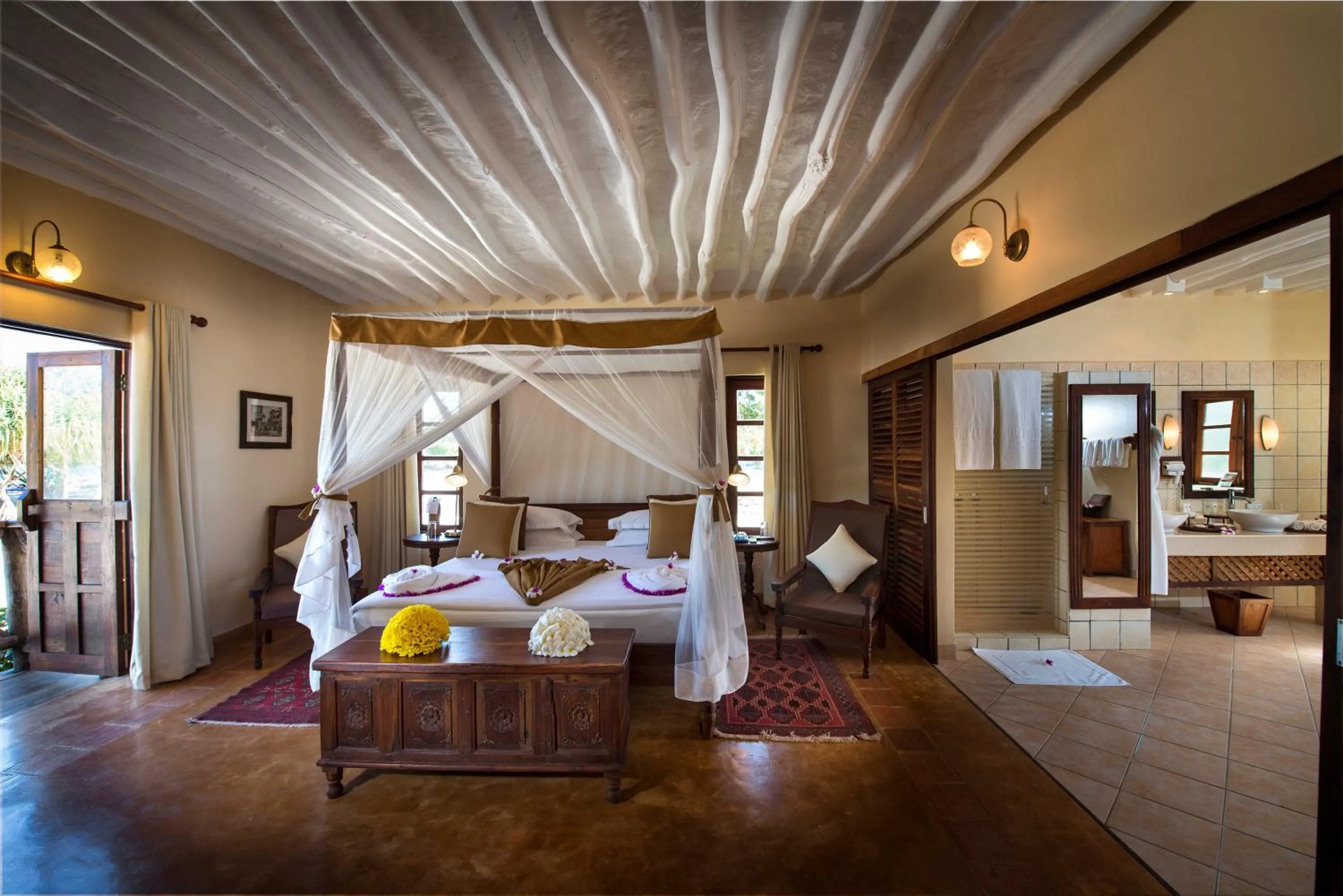 Bed in Neptune Pwani Beach Resort & Spa Zanzibar - All Inclusive