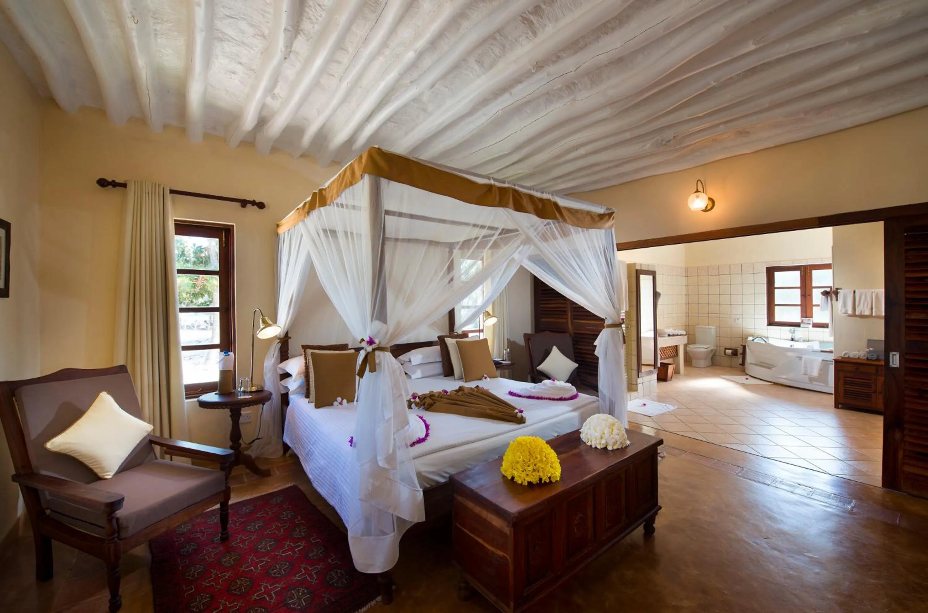 Bed in Neptune Pwani Beach Resort & Spa Zanzibar - All Inclusive