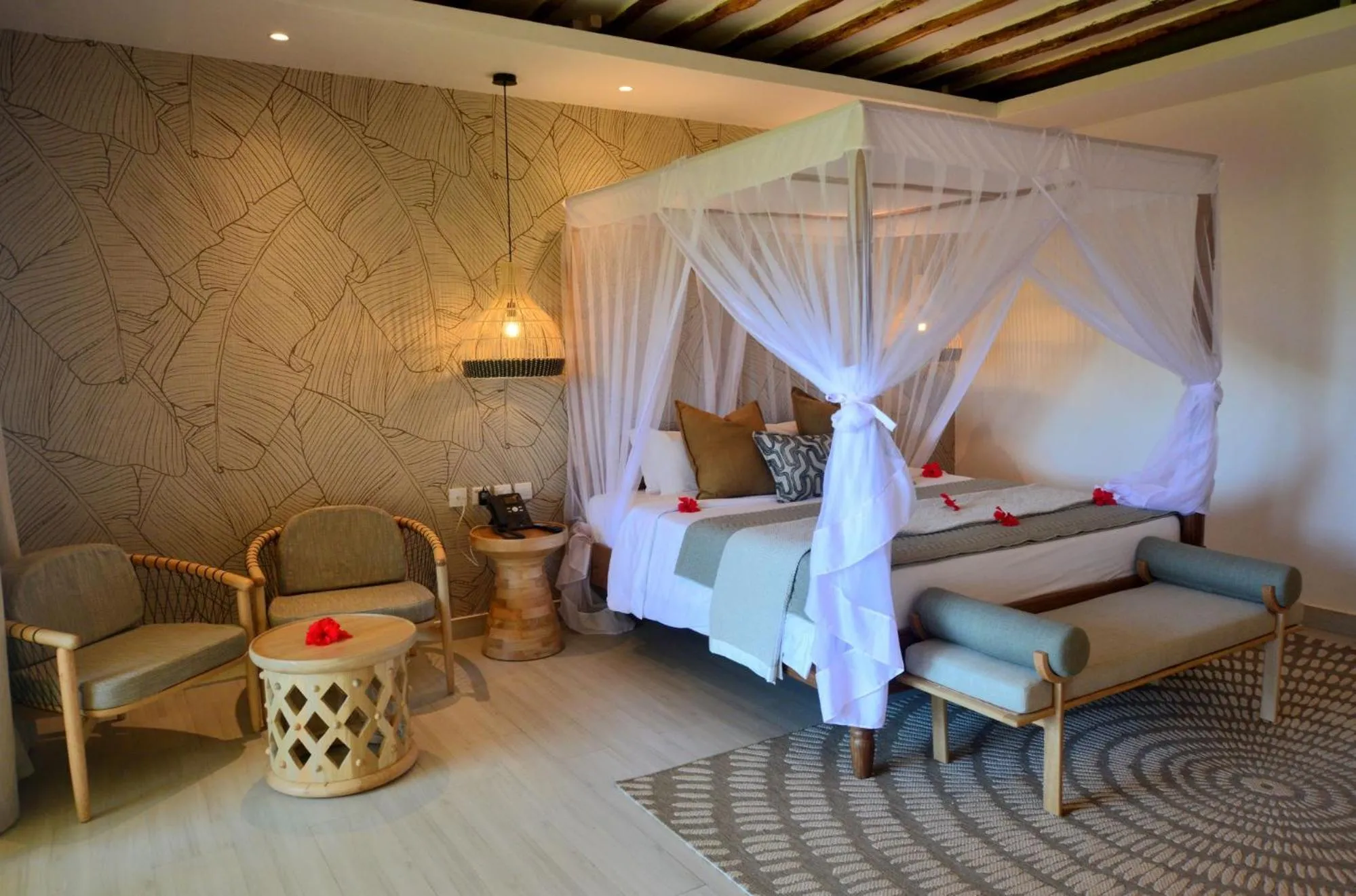 Bed in Neptune Pwani Beach Resort & Spa Zanzibar - All Inclusive