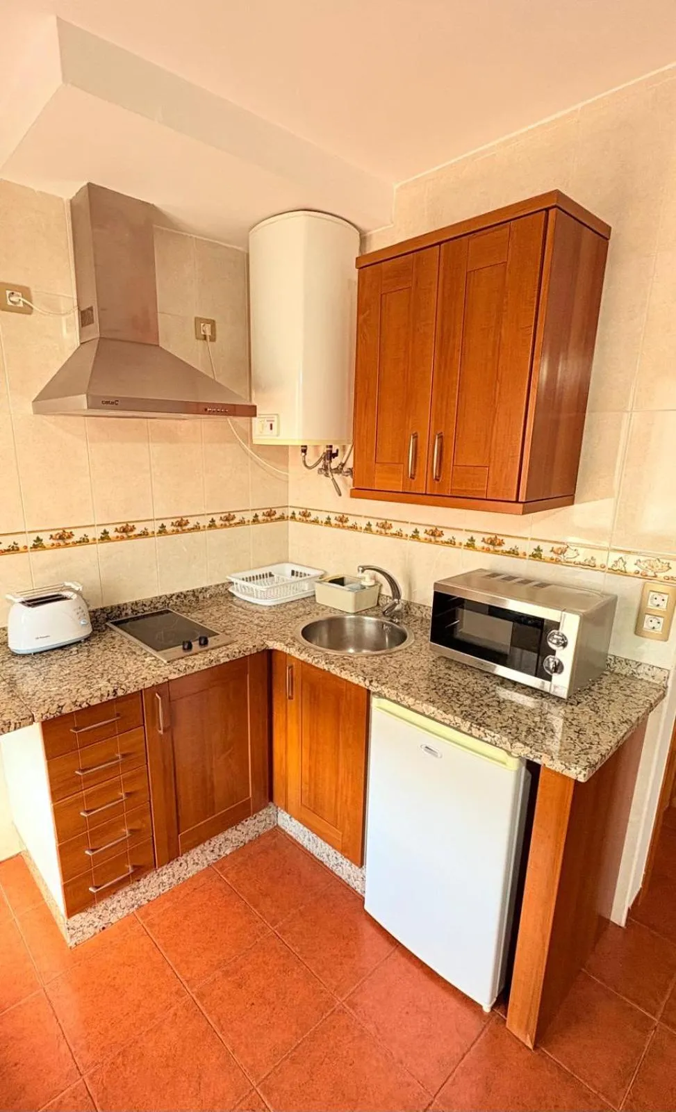 Kitchen or kitchenette in Apartamentos Luarca