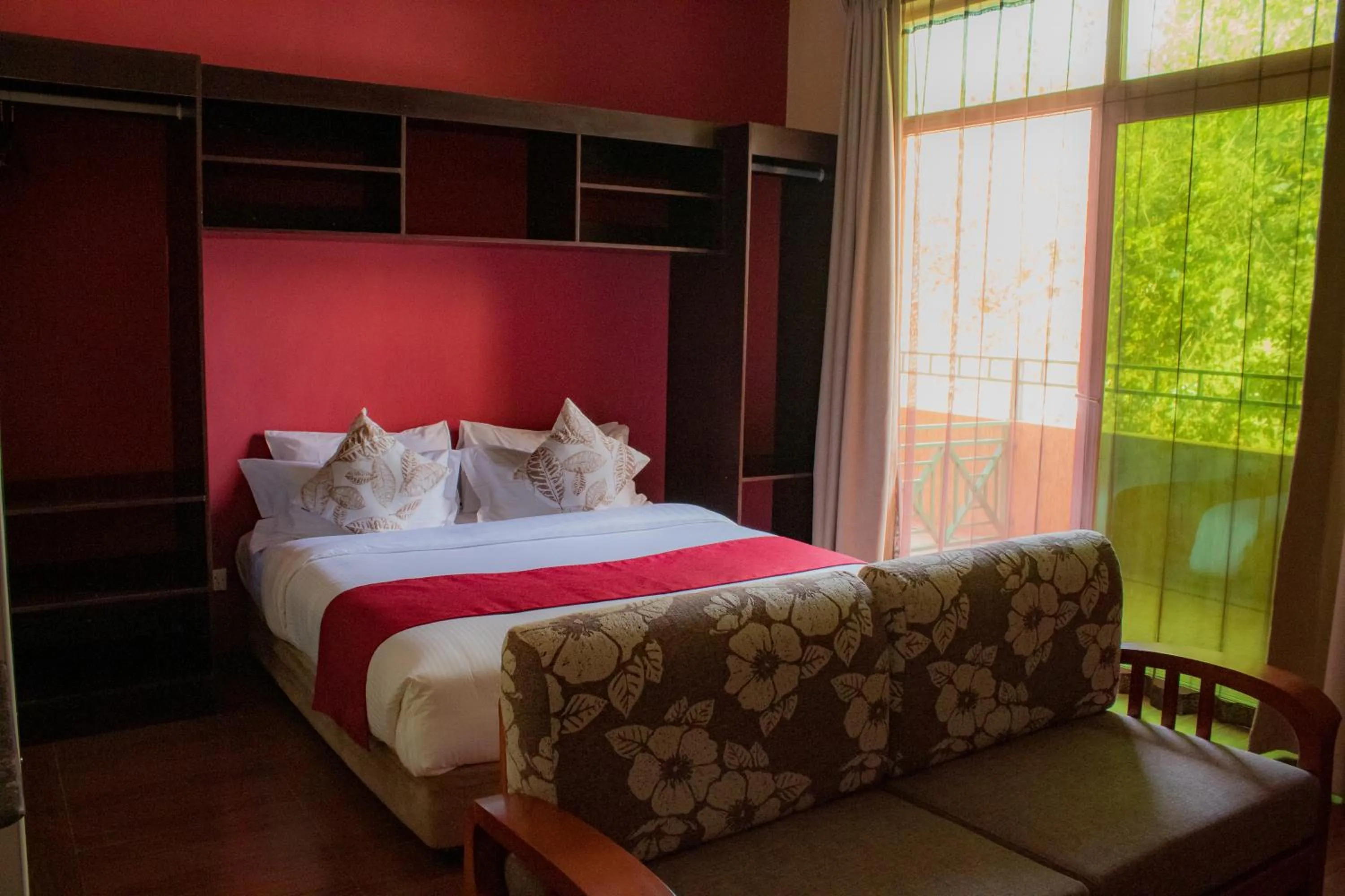 Bed in MalVille Boutique Hotel