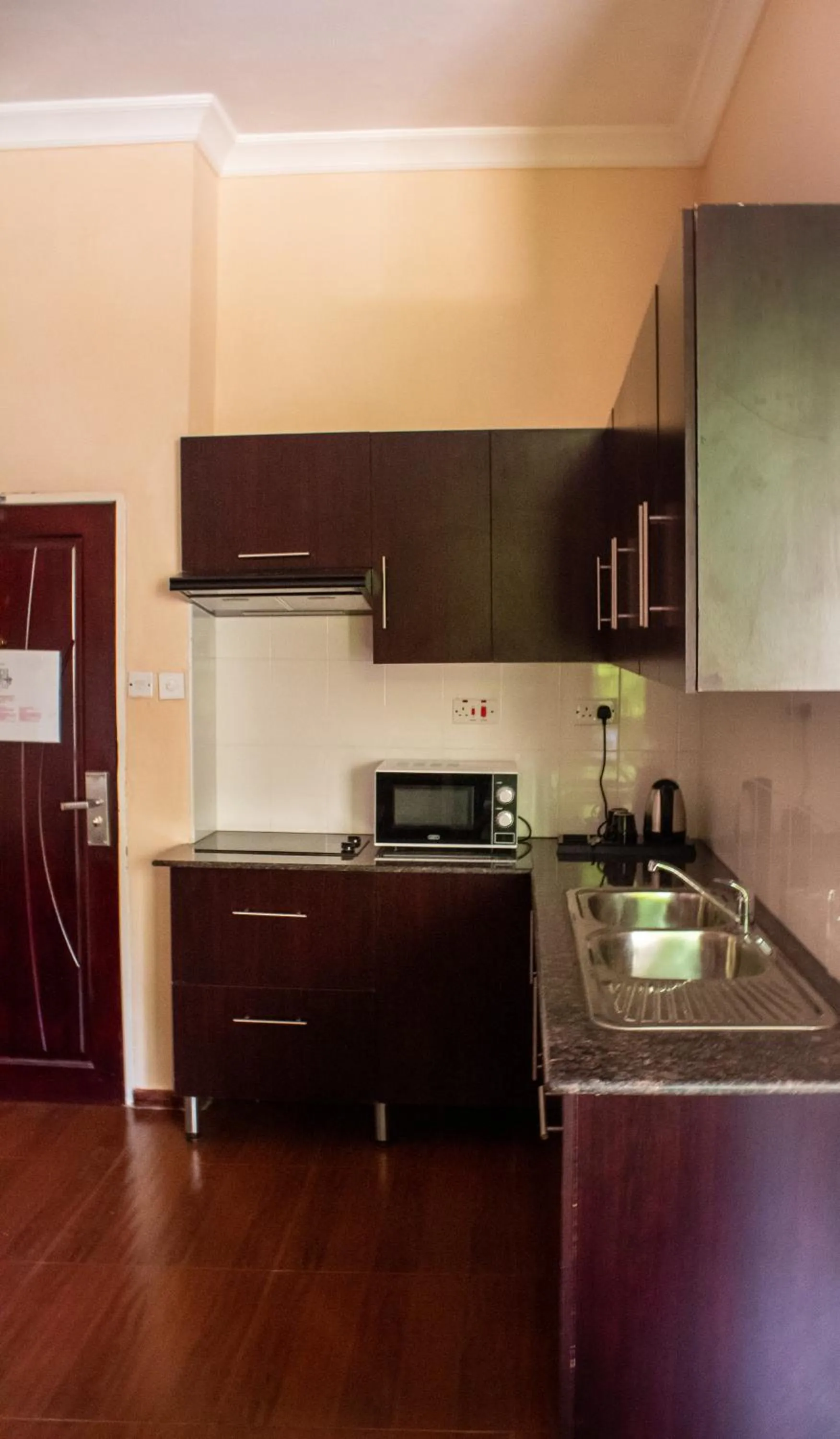Kitchen or kitchenette in MalVille Boutique Hotel