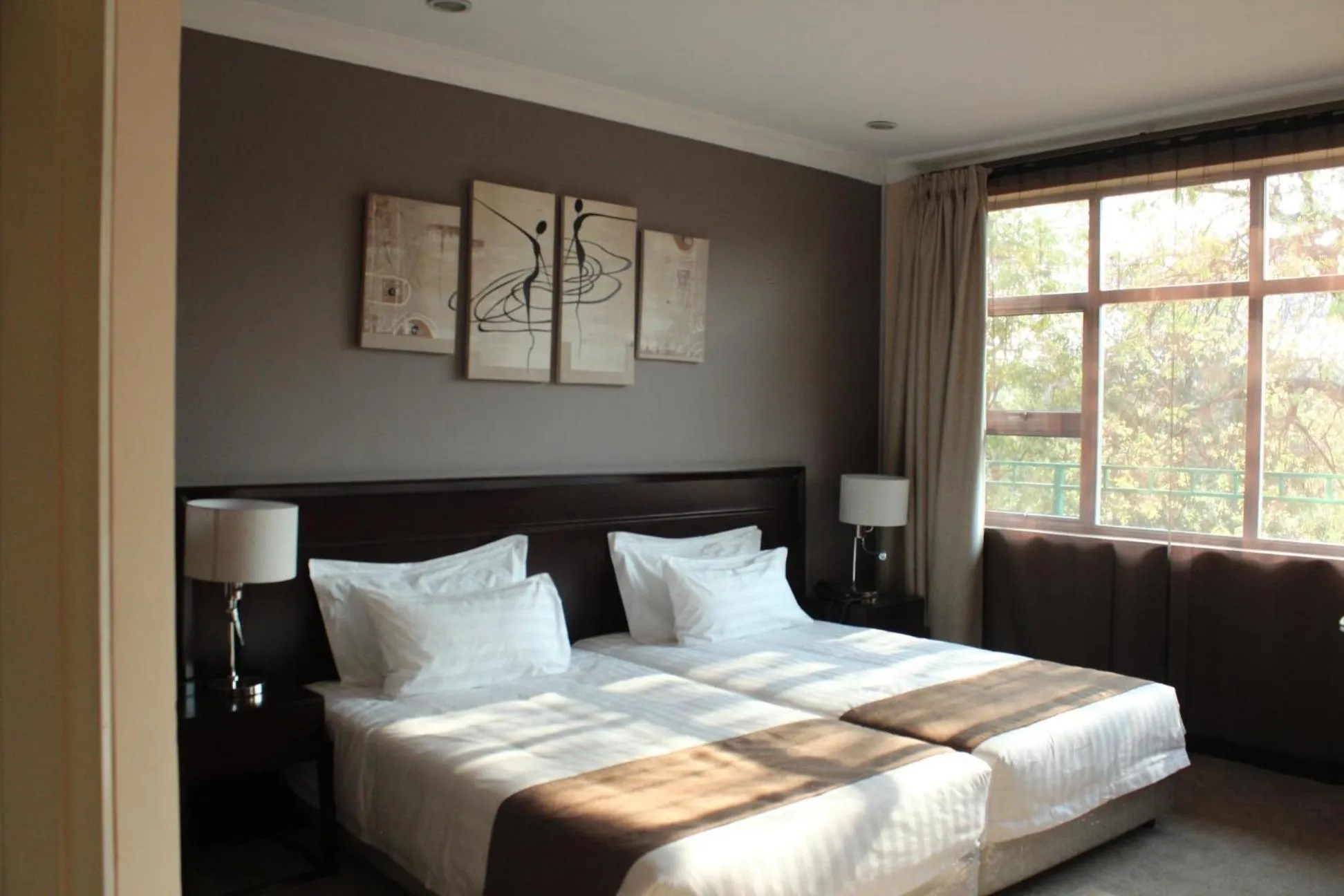 Bed in MalVille Boutique Hotel